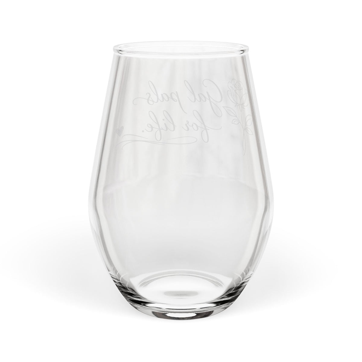 Clear glass with embossed design on a white background