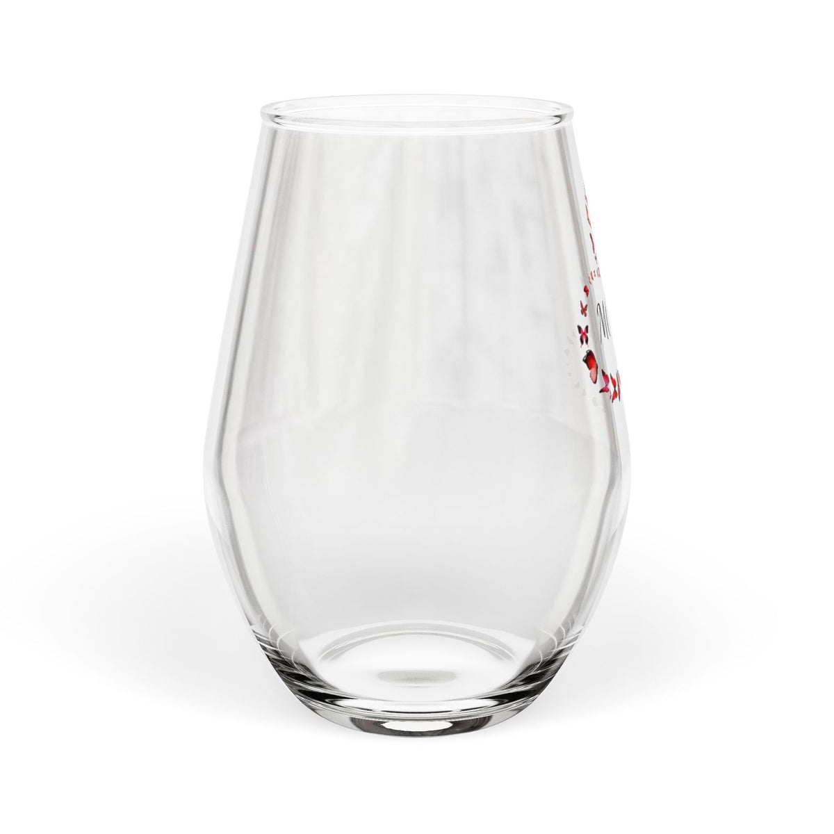 Clear glass tumbler with red text on a white background