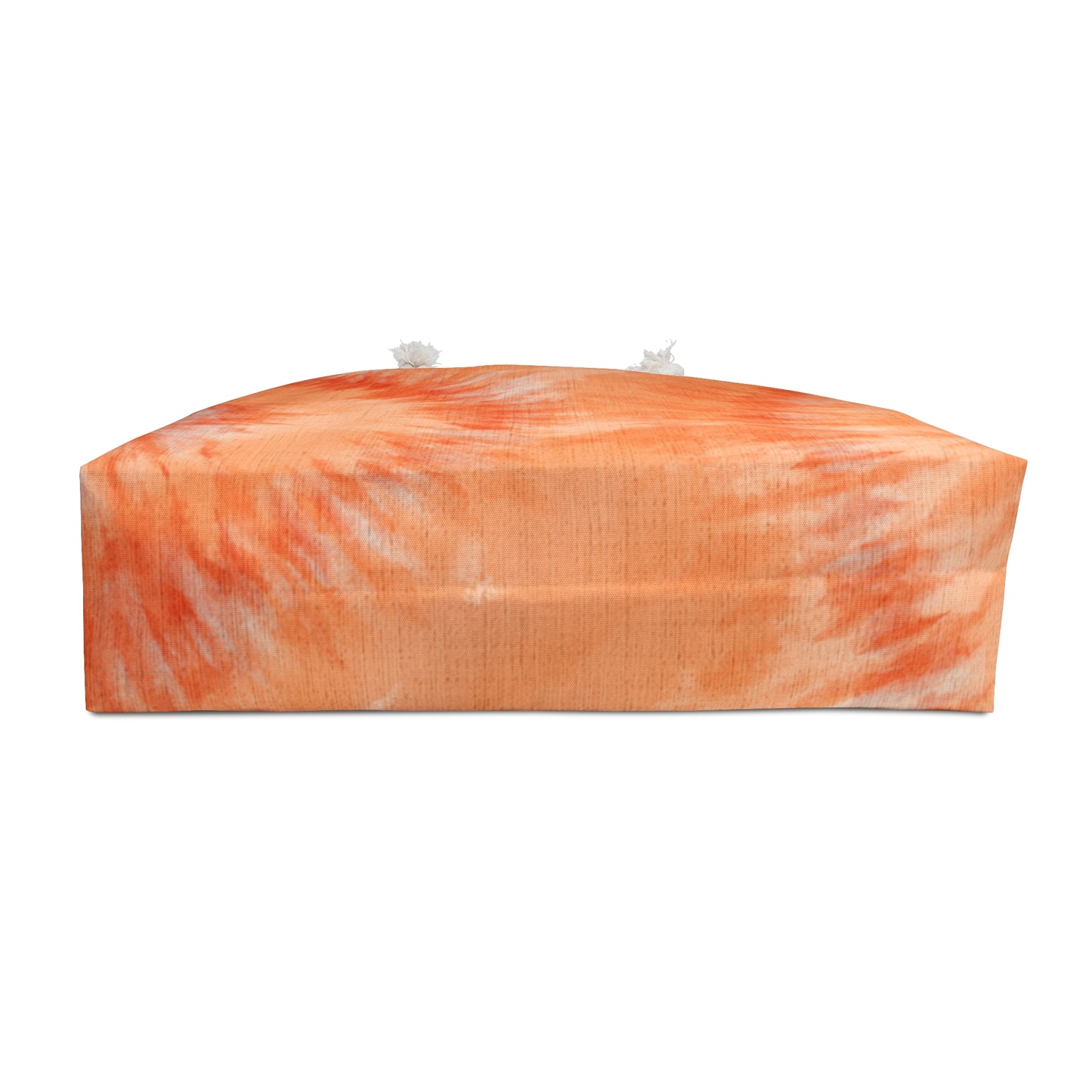 Rectangular candle with orange and white marbled pattern on a white background