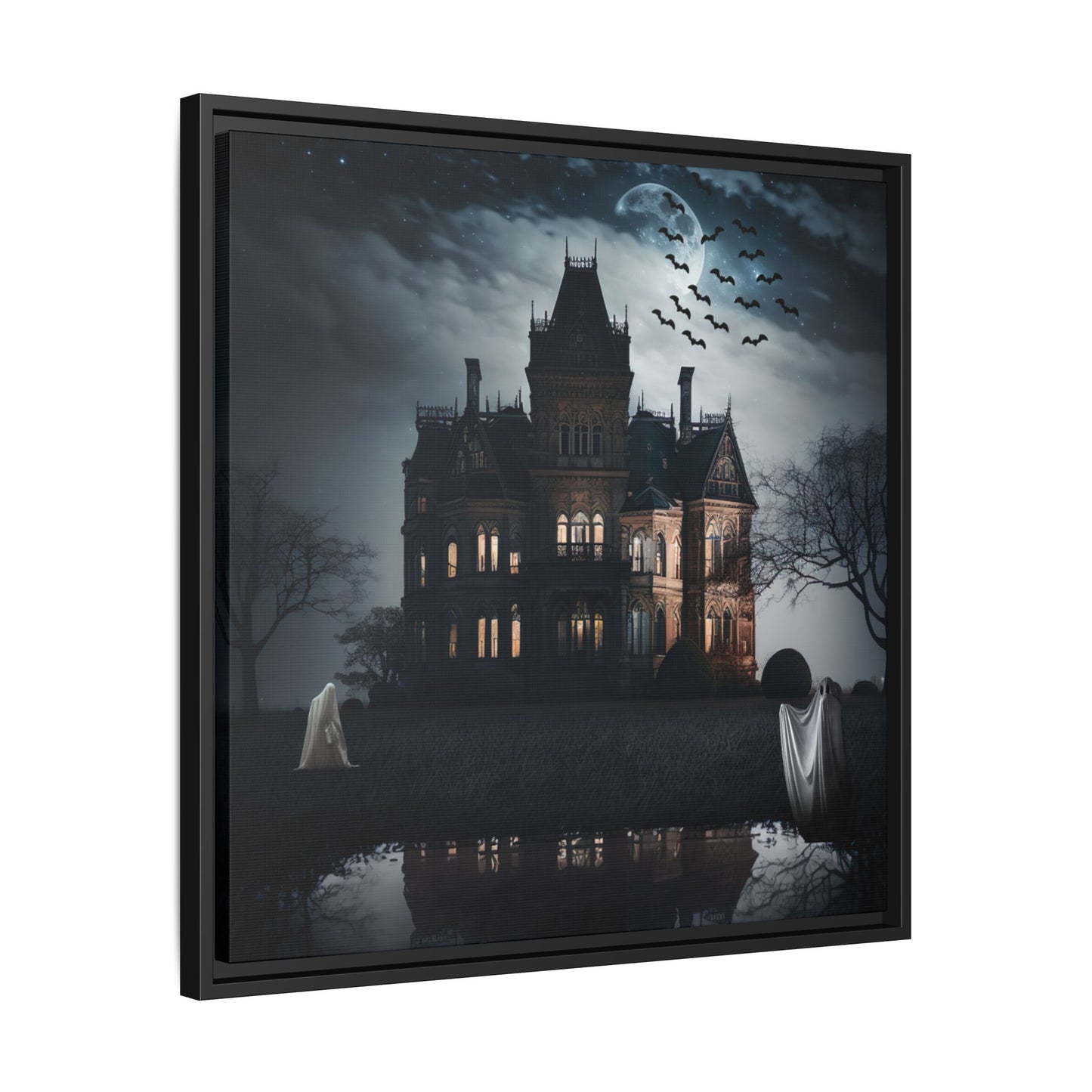 Framed artwork of a haunted house with ghosts and bats at night.