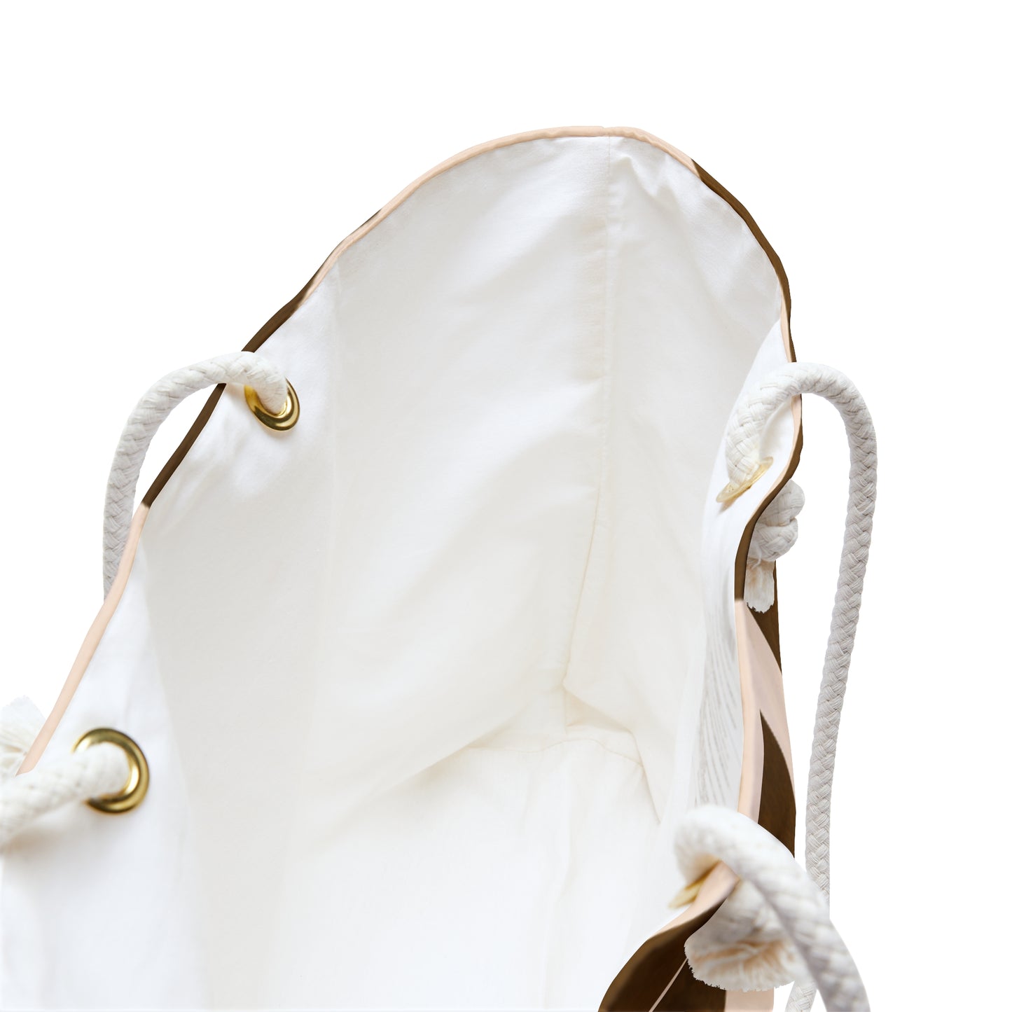 Close-up of a white drawstring bag with gold accents on a white background