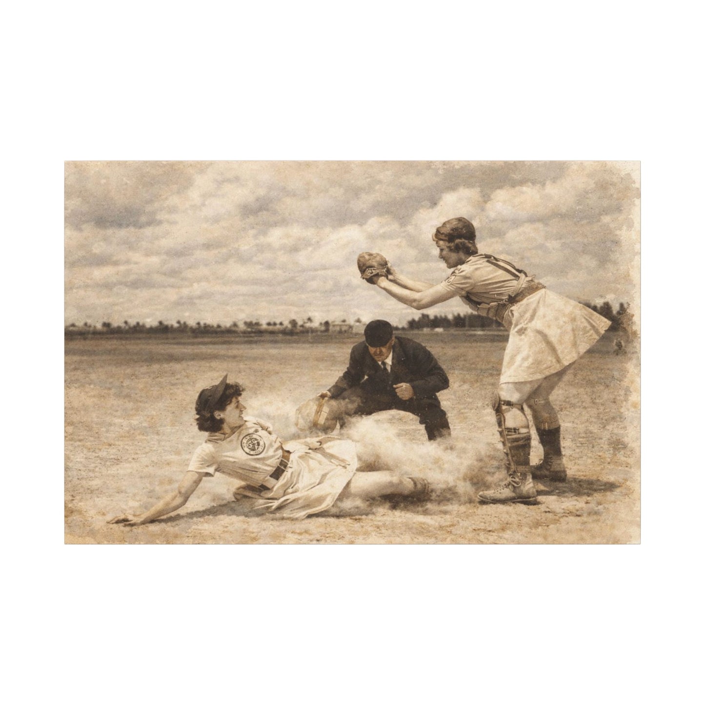 Vintage photograph of a baseball game with a player sliding into home plate and another player catching the ball.