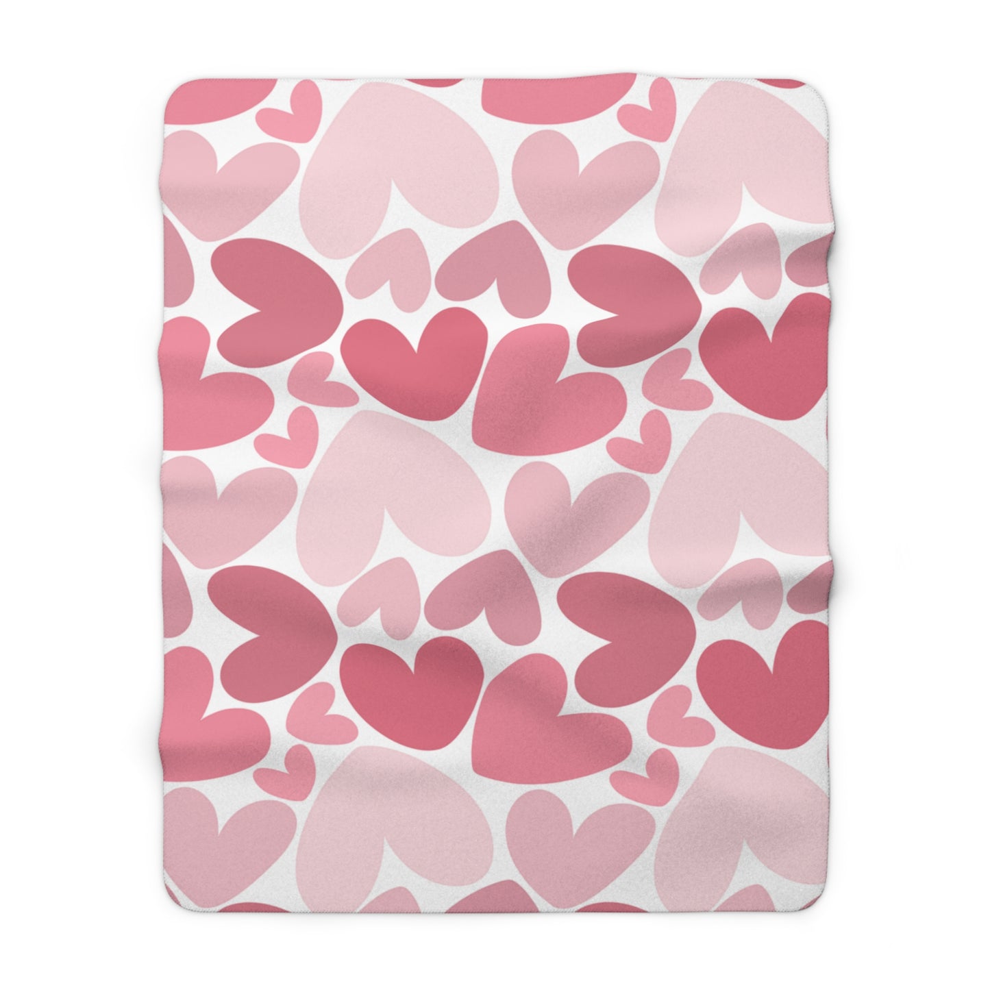 Blanket with pink heart pattern on a white background