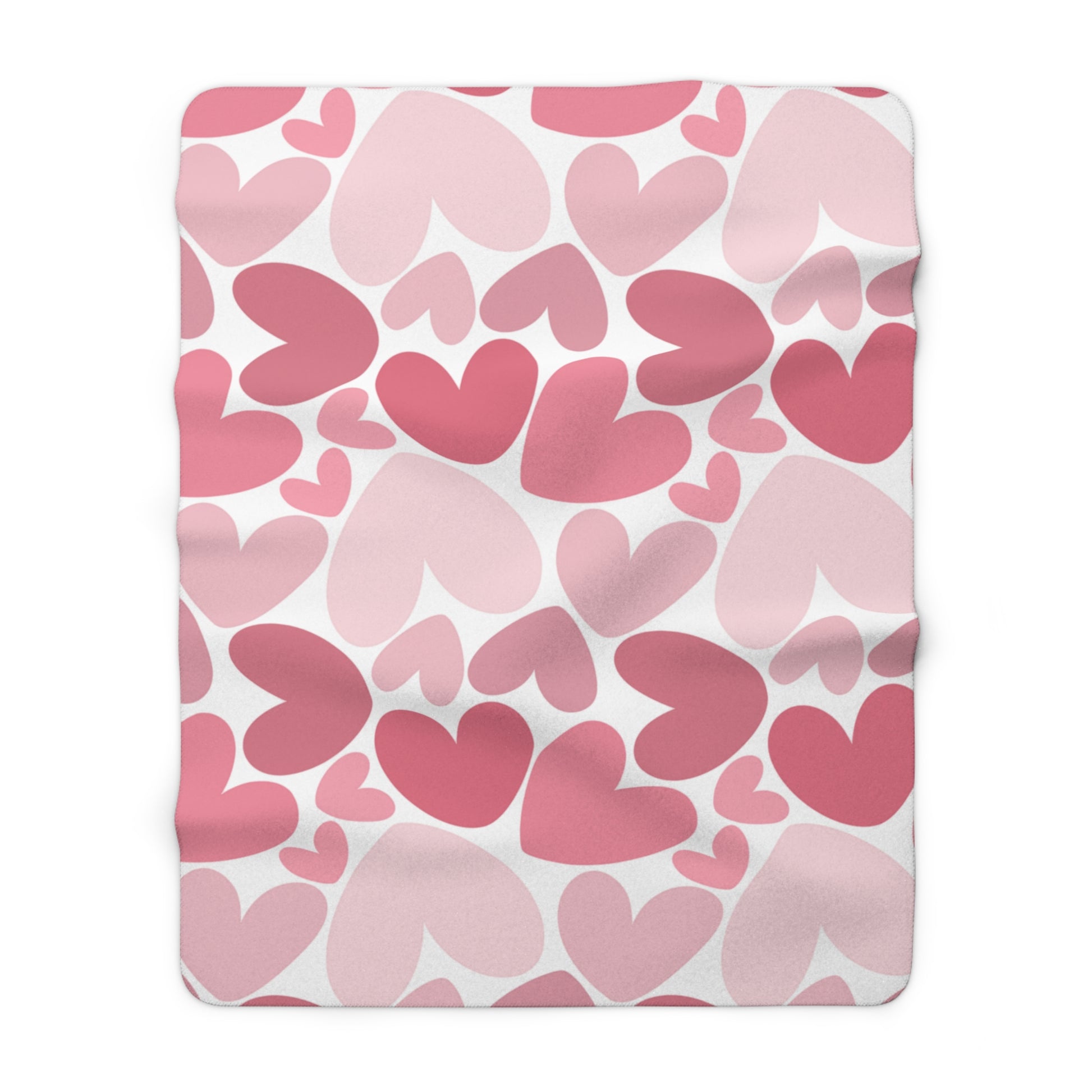 Blanket with pink heart pattern on a white background