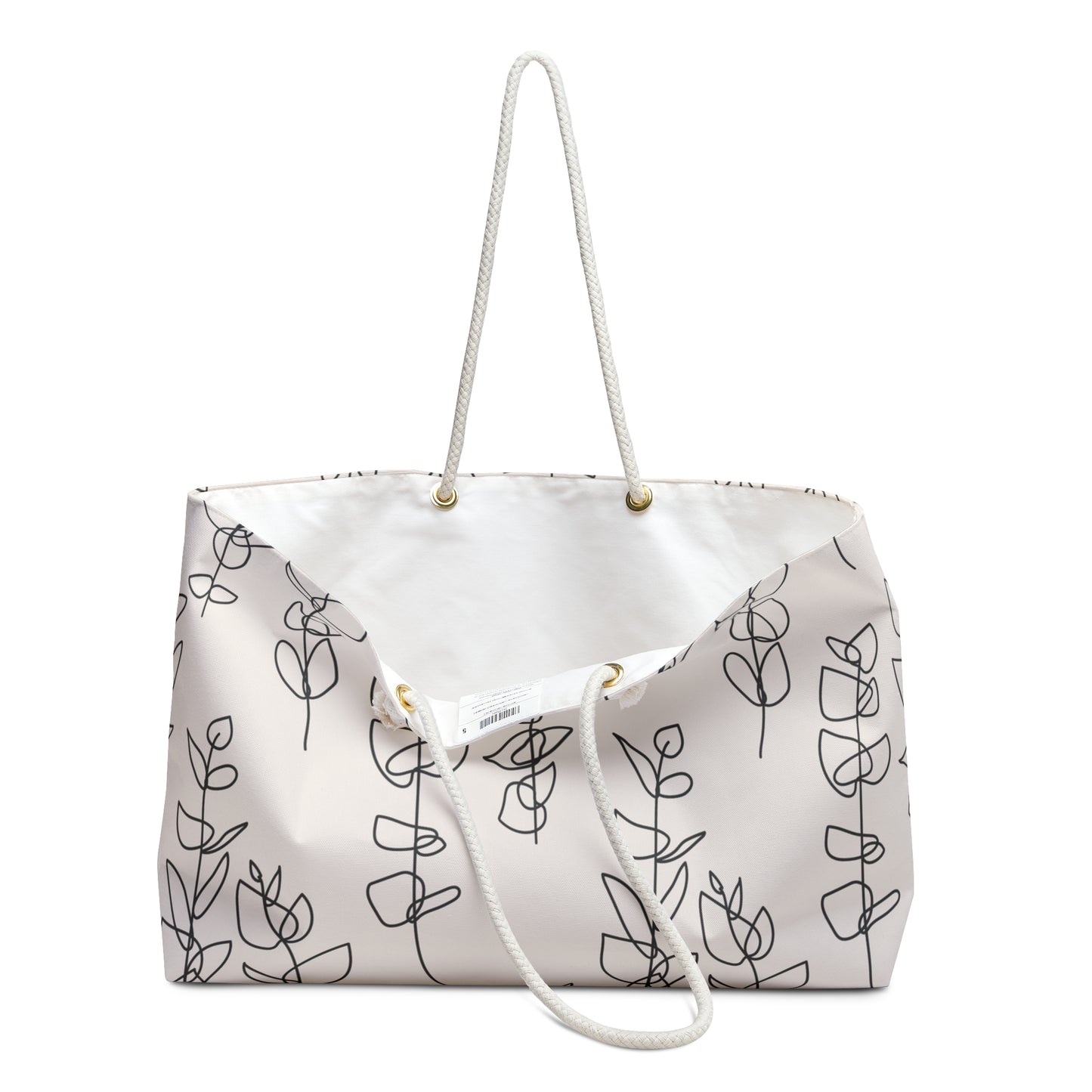 White tote bag with black leaf pattern on a white background