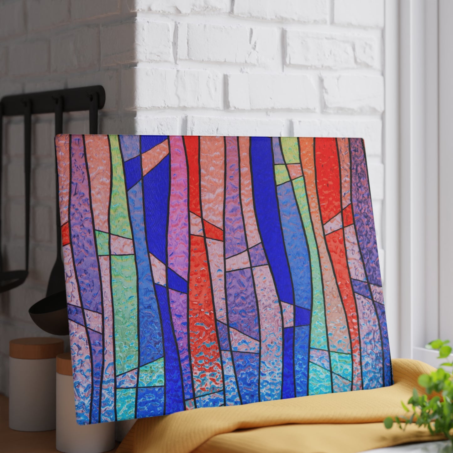 Colorful abstract patterned headboard against a white brick wall.