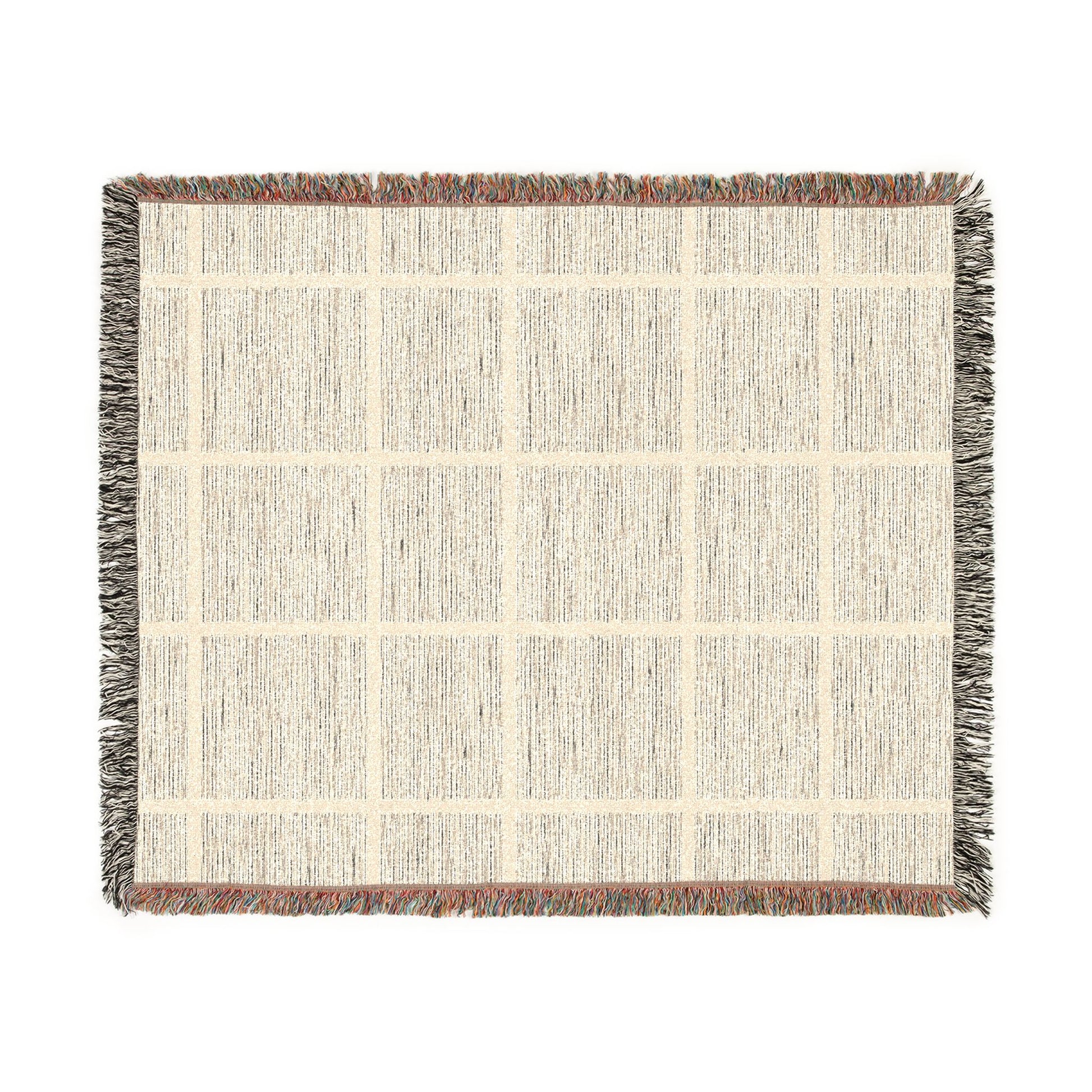 Textured woven blanket with a grid pattern on a white background