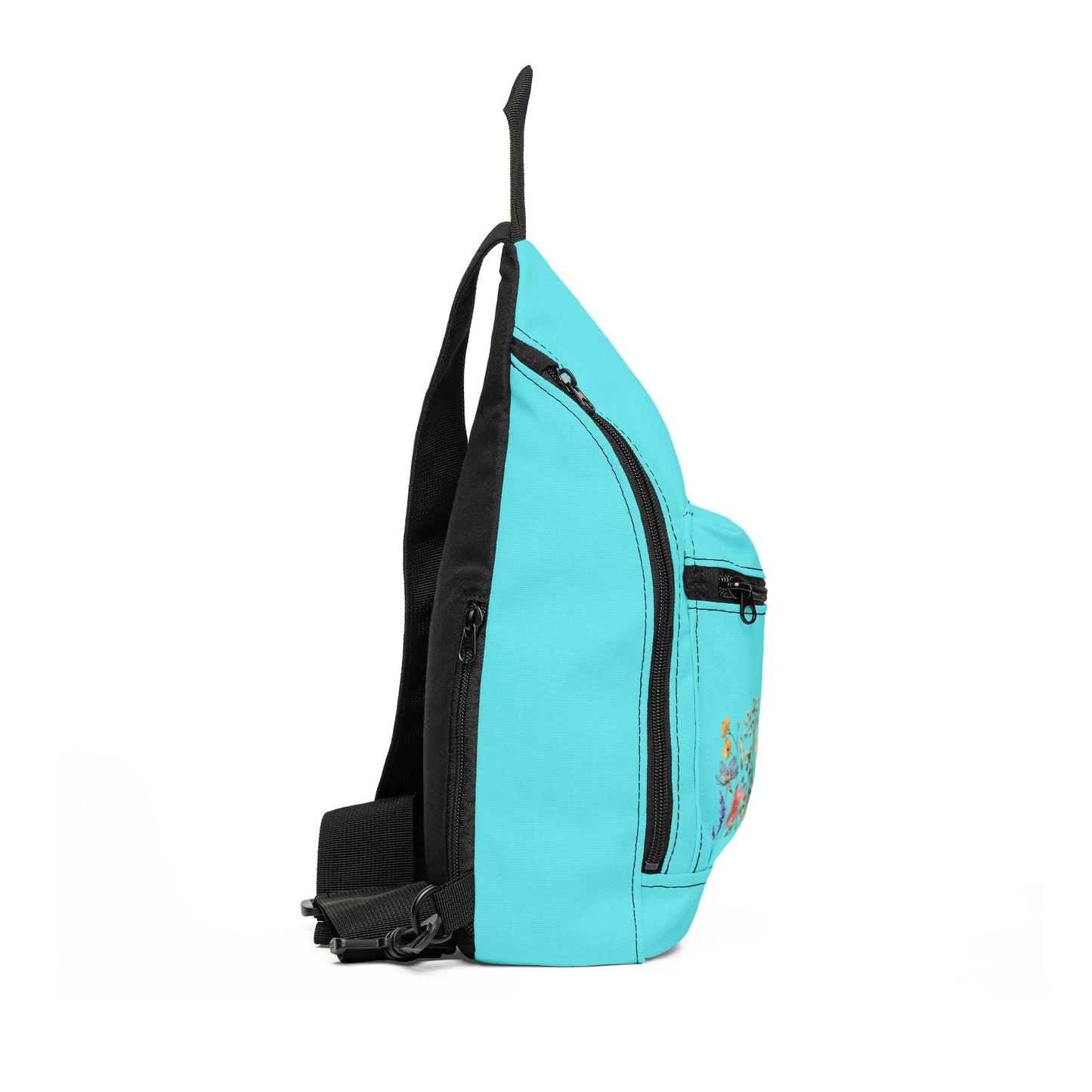 Turquoise sling bag with black straps on a white background