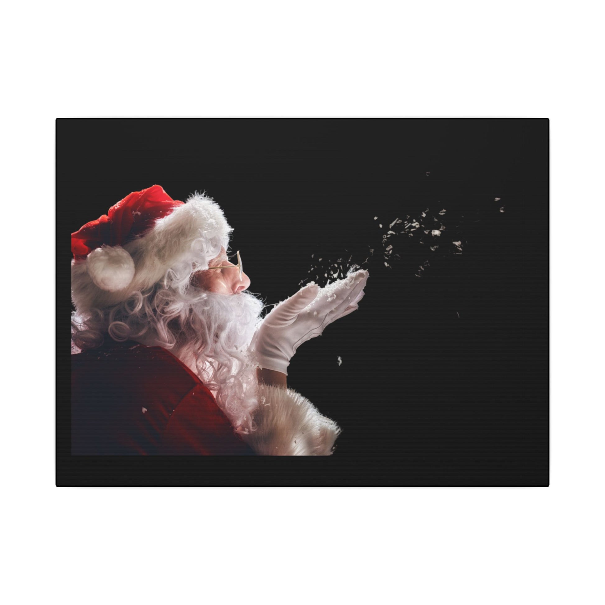 Santa Claus blowing snowflakes against a black background