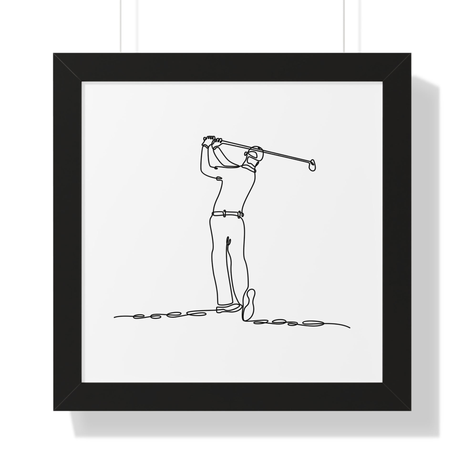 Framed artwork of a line drawing of a golfer in a black frame.