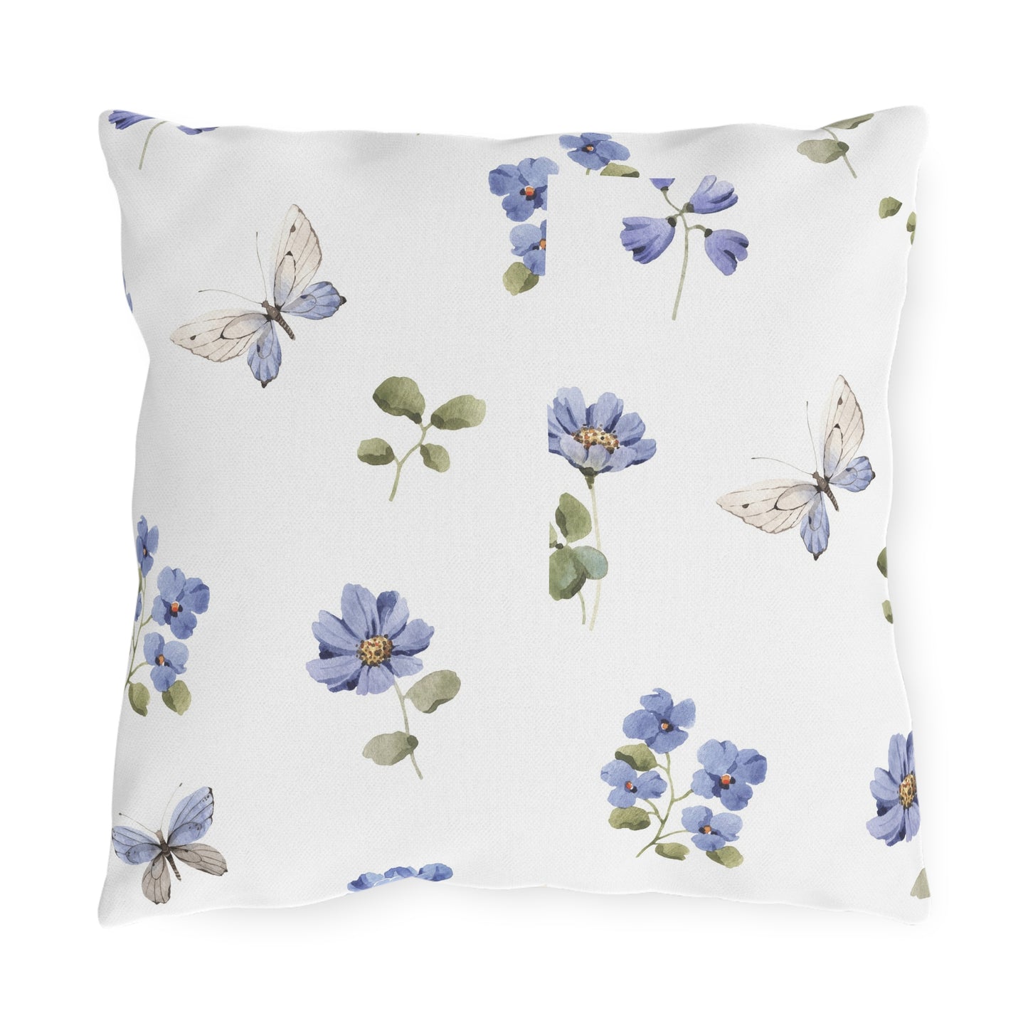 Decorative pillow with blue flowers and butterflies on a white background