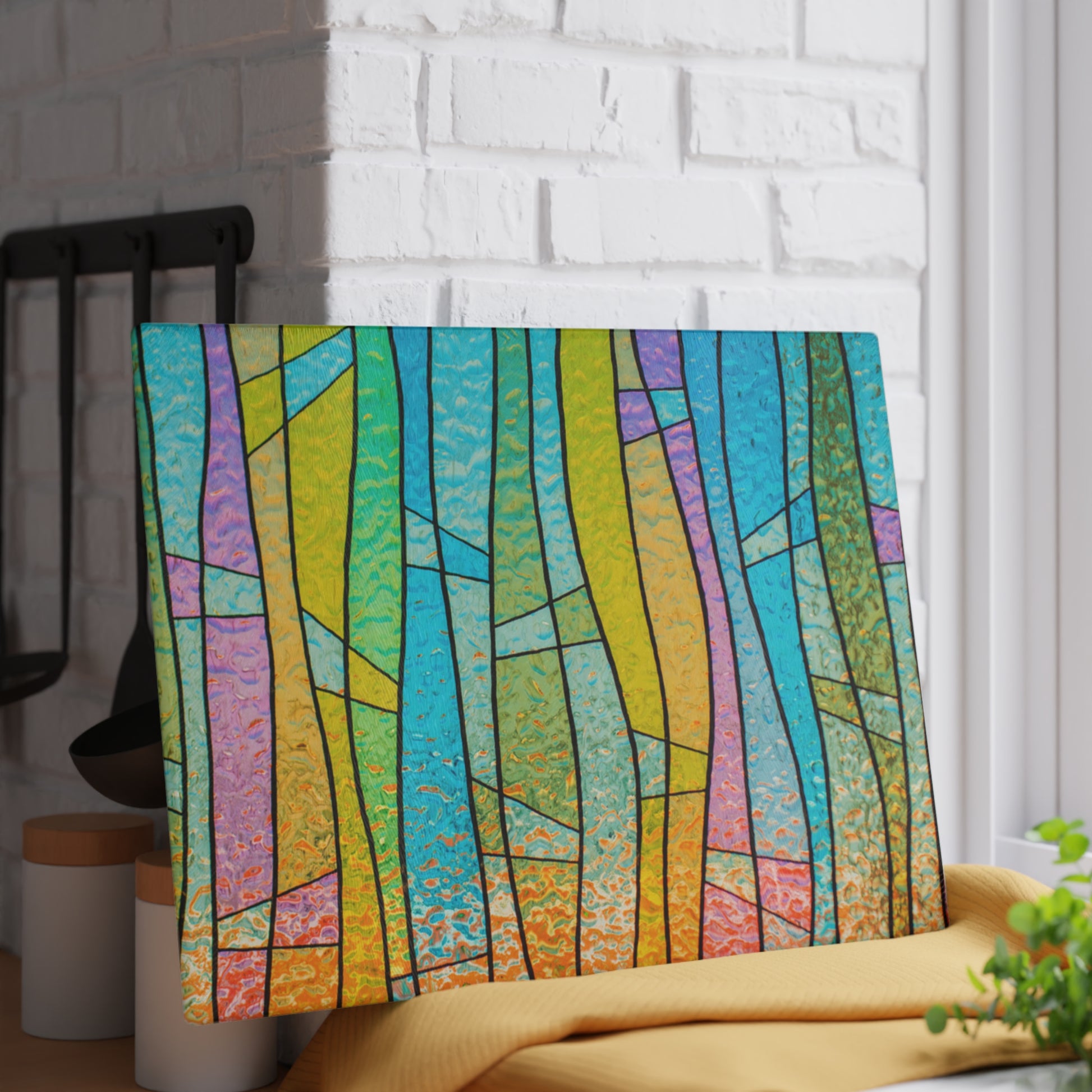 Colorful abstract patterned headboard against a white brick wall.
