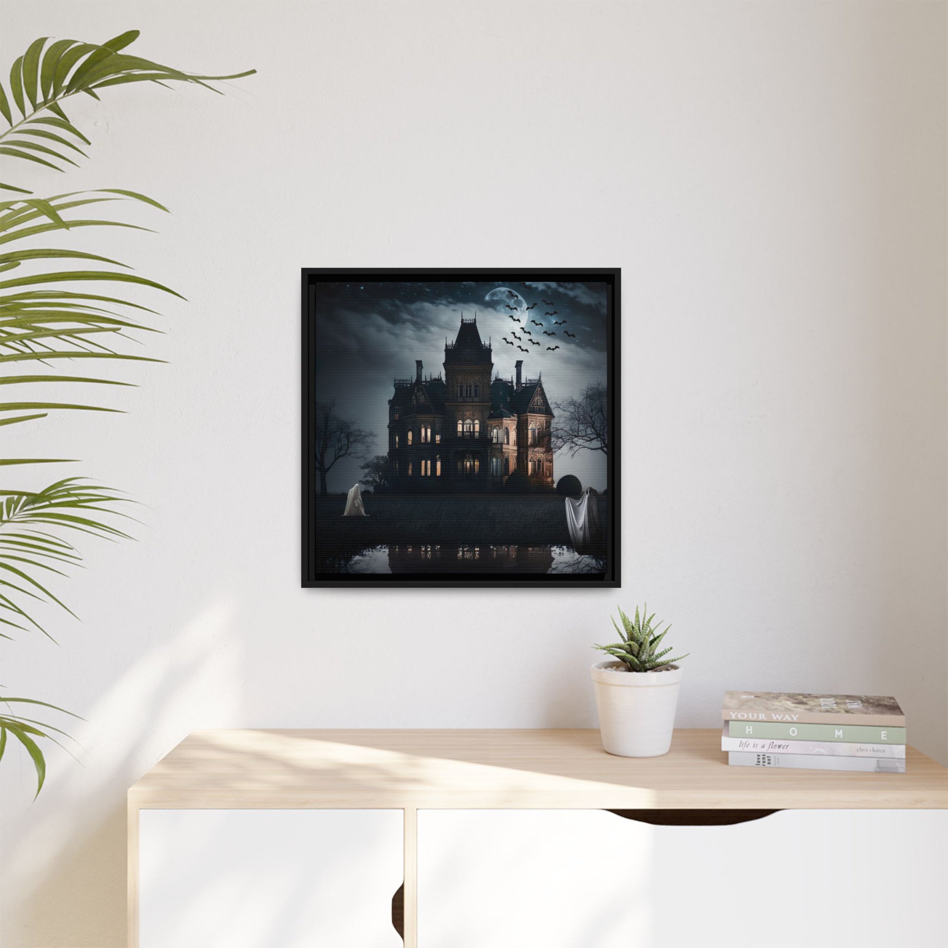 Mansion at night with ghosts and bats, framed artwork