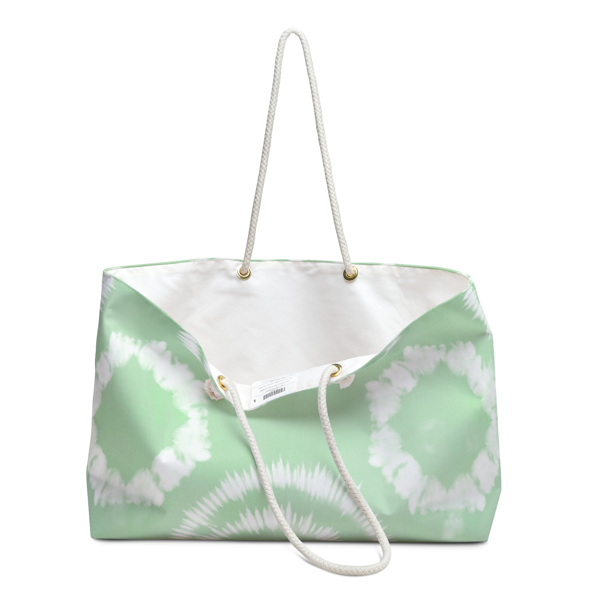 Tie-dye tote bag with a white handle on a white background