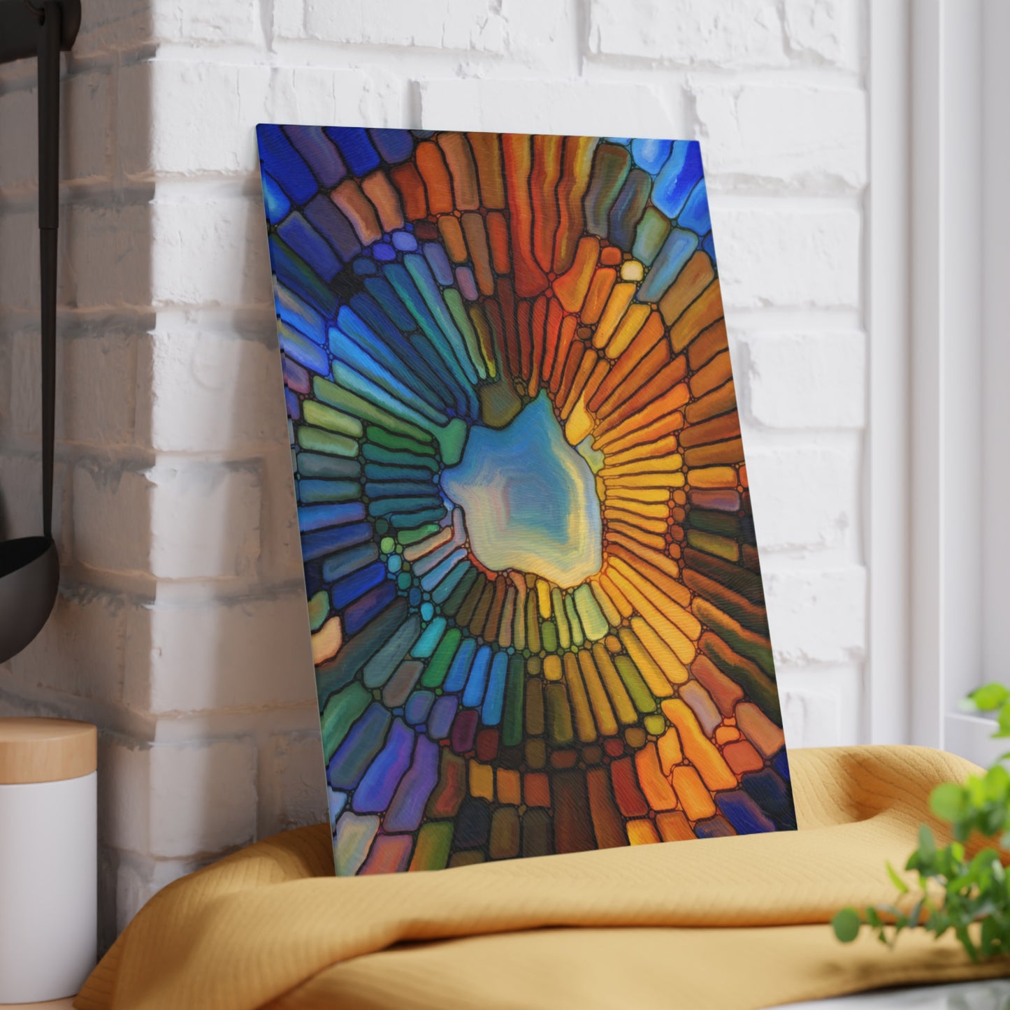 Colorful abstract art piece on a white brick wall