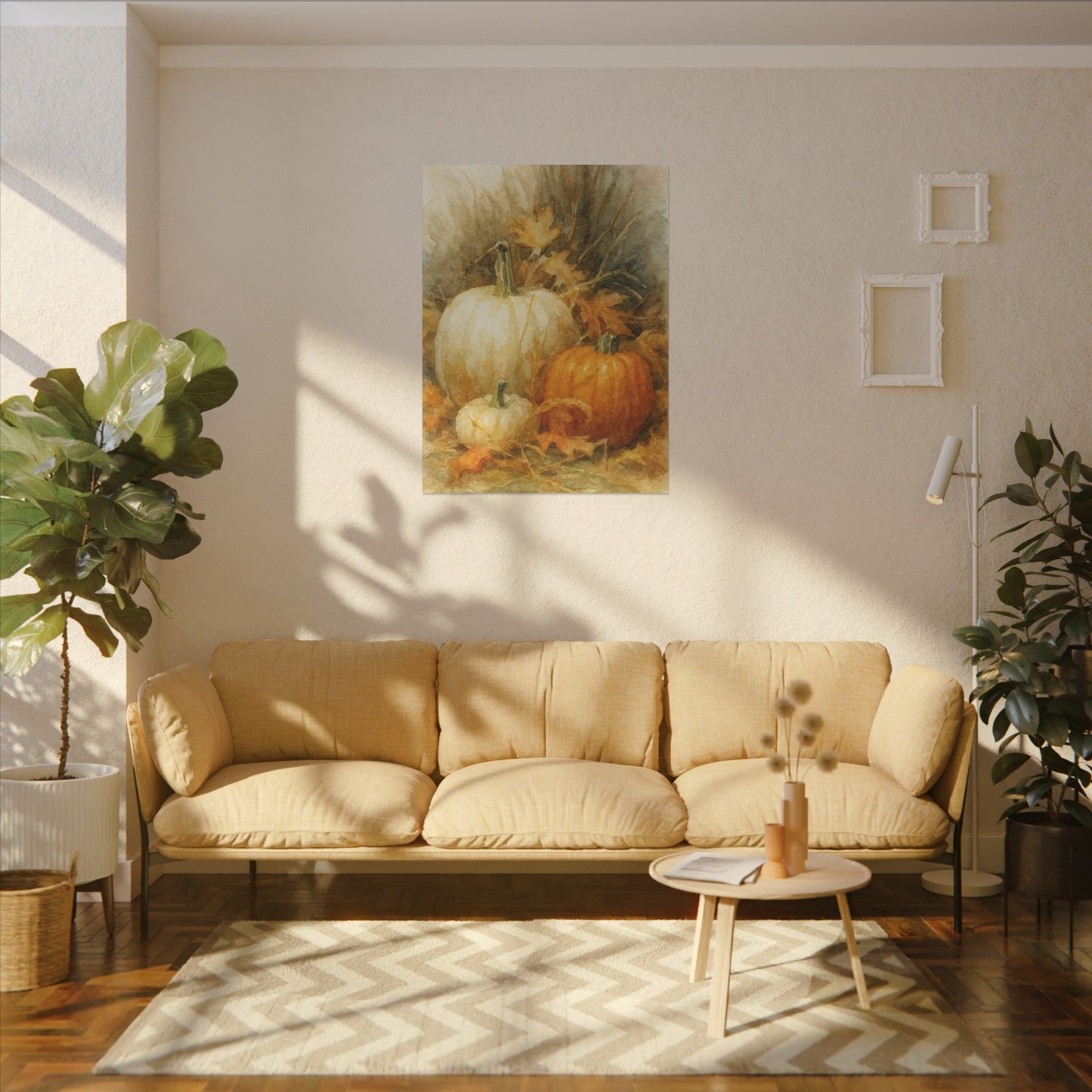 Living room with beige sofa, coffee table, and wall art of pumpkins.