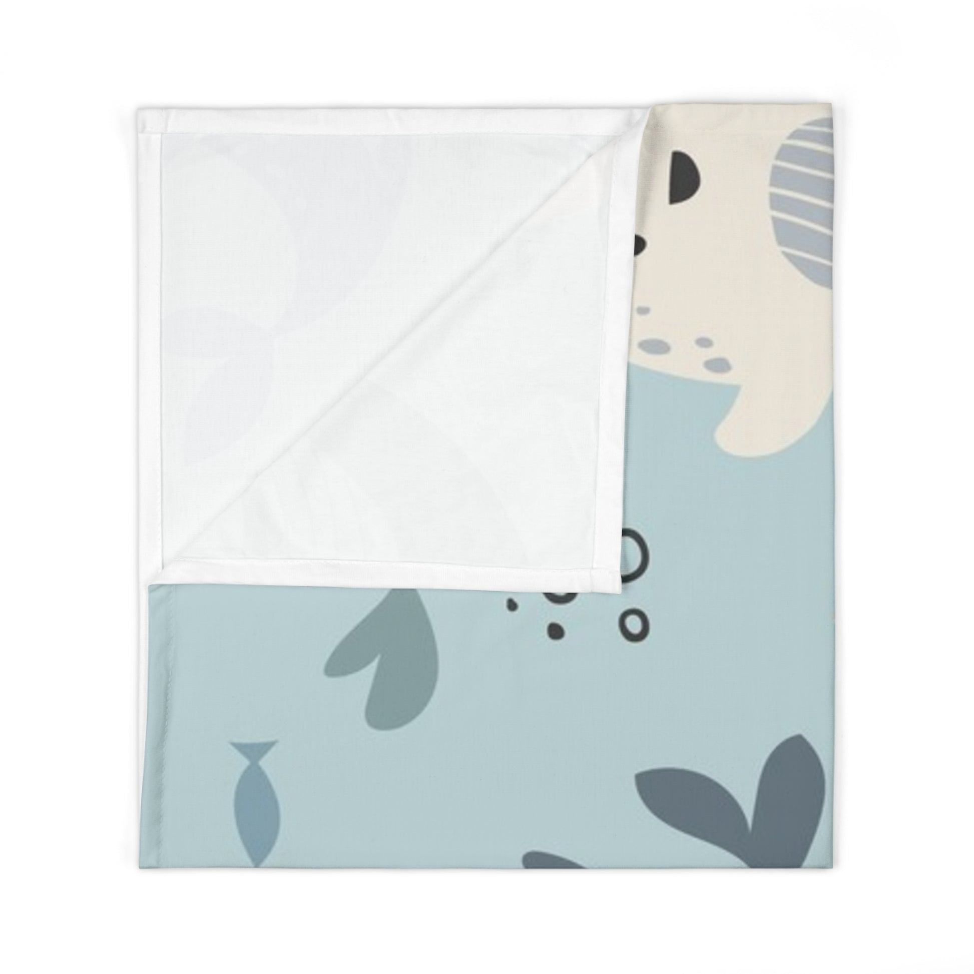 Baby blanket with elephant design on a light blue background