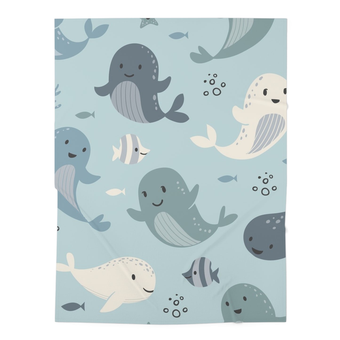 Pattern of cartoon whales and fish on a light blue background