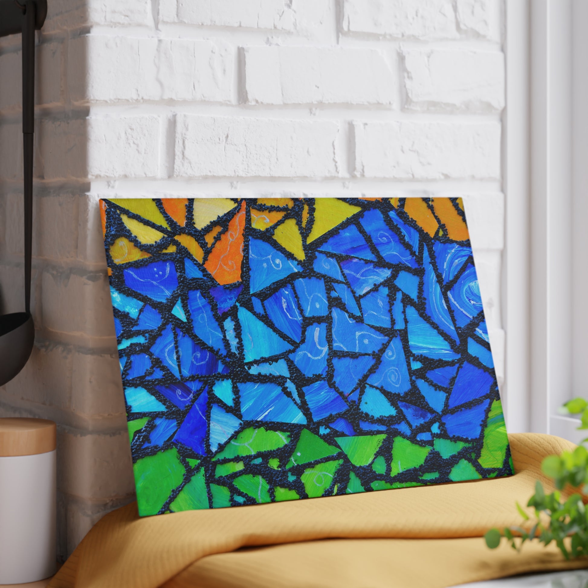 Colorful abstract painting on a white brick wall