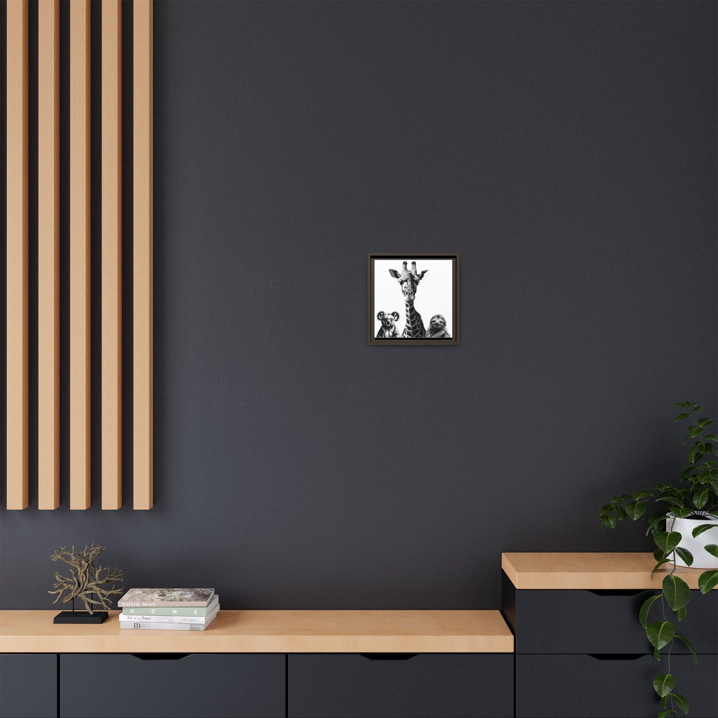 Framed artwork of a house on a dark gray wall with wooden shelves and decor.