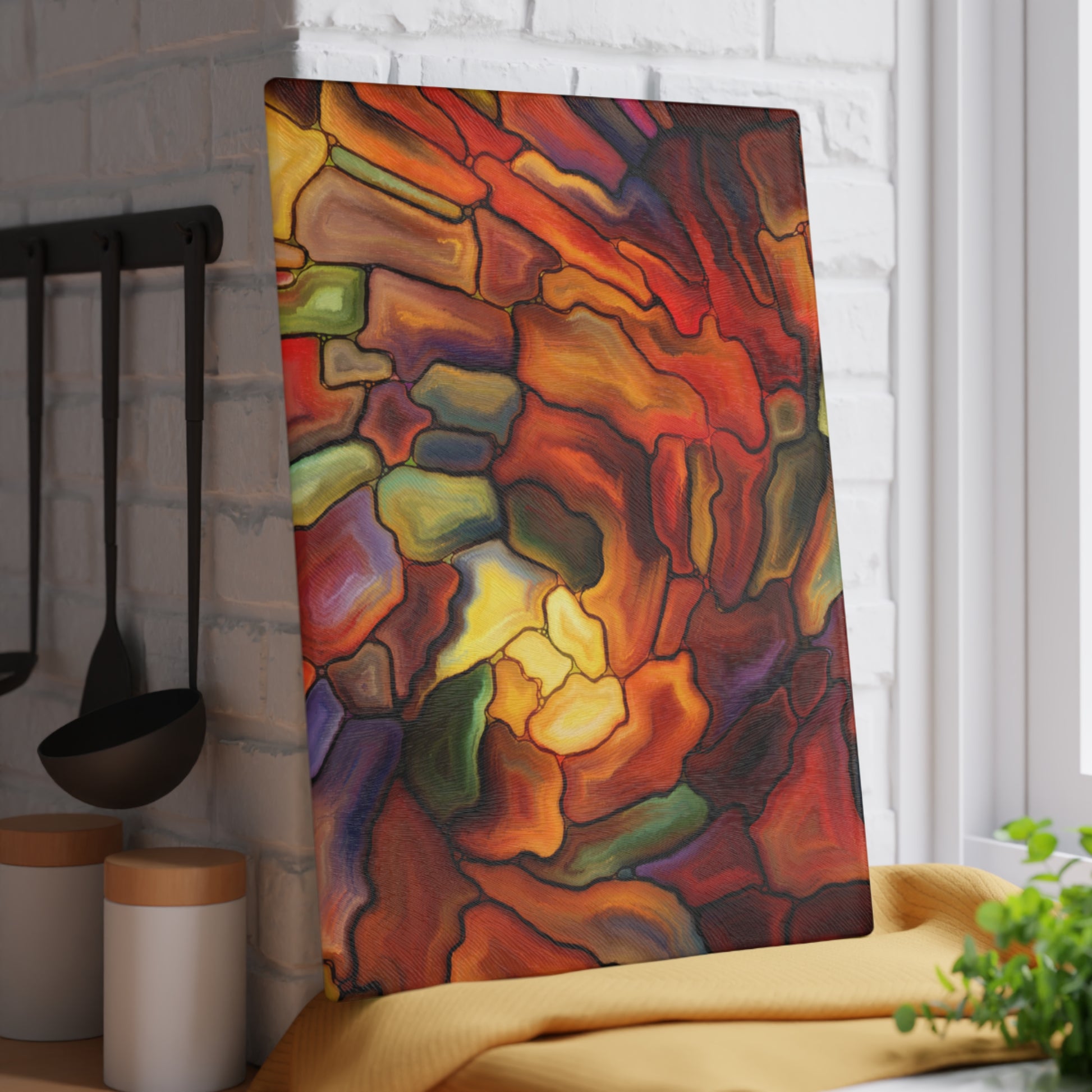 Colorful abstract painting in a kitchen setting with utensils and decor.