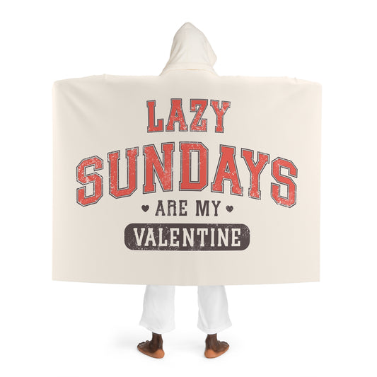Person wearing a hoodie with 'Lazy Sundays are my Valentine' text on a white background