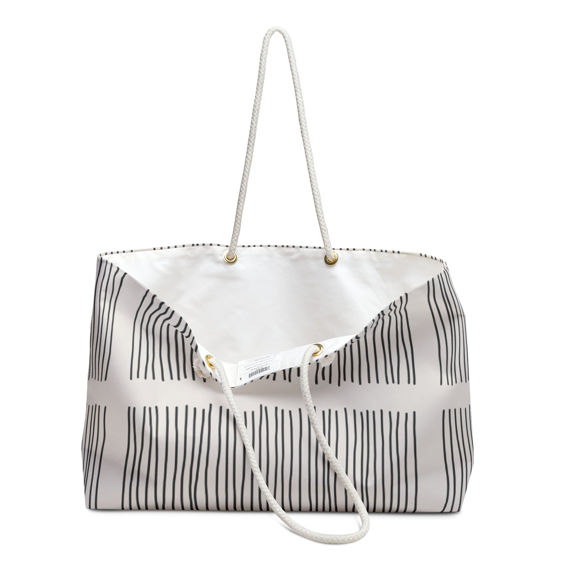 Striped tote bag with a white handle on a white background