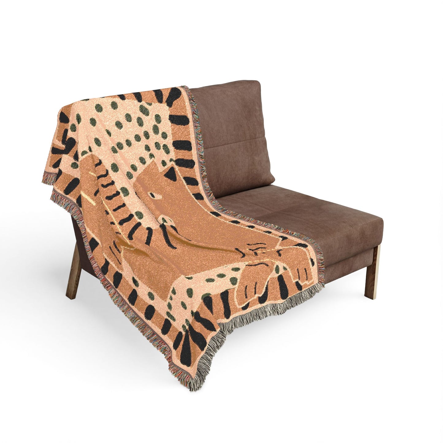 Brown chair with a cheetah patterned blanket draped over it on a white background