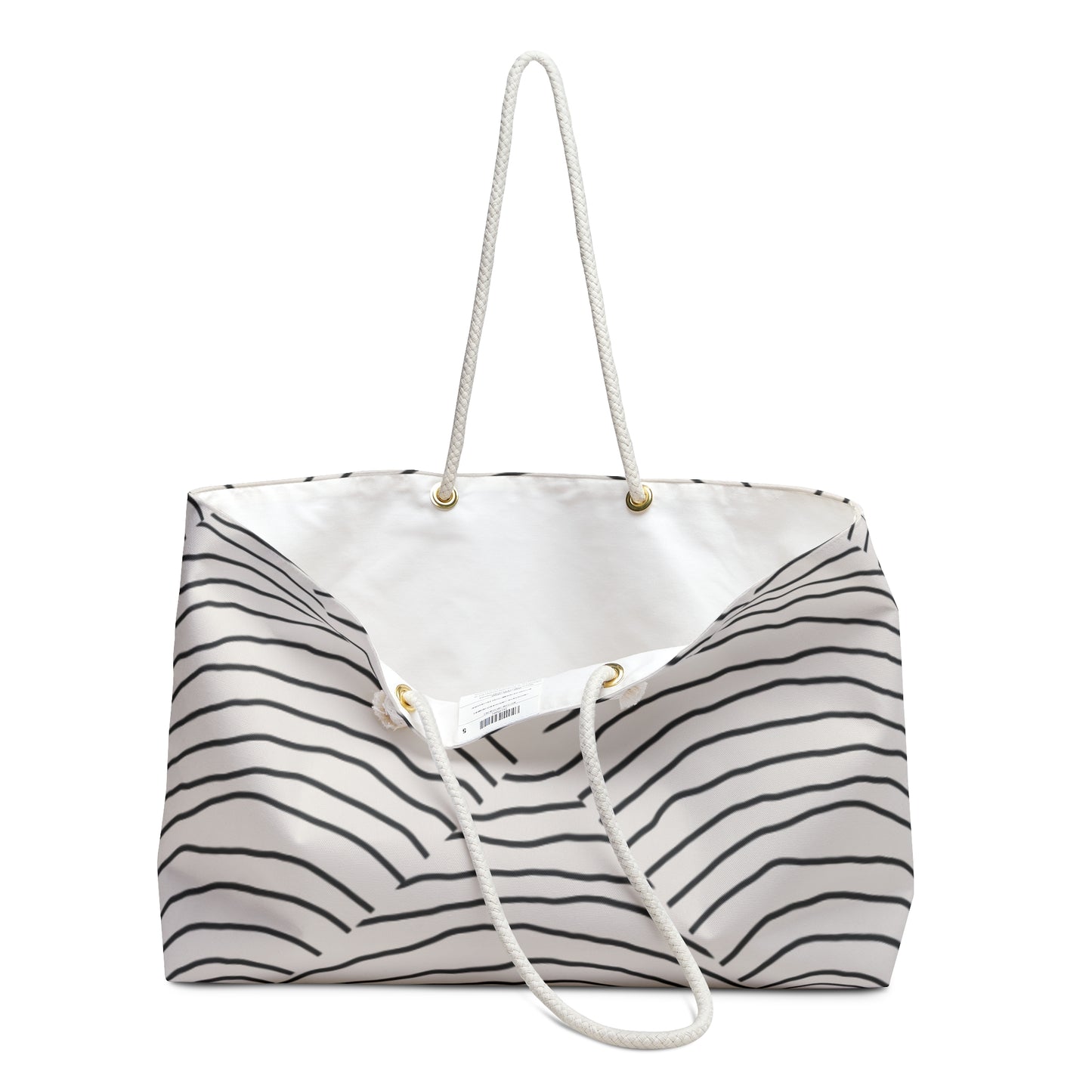 Striped tote bag with a white handle on a white background