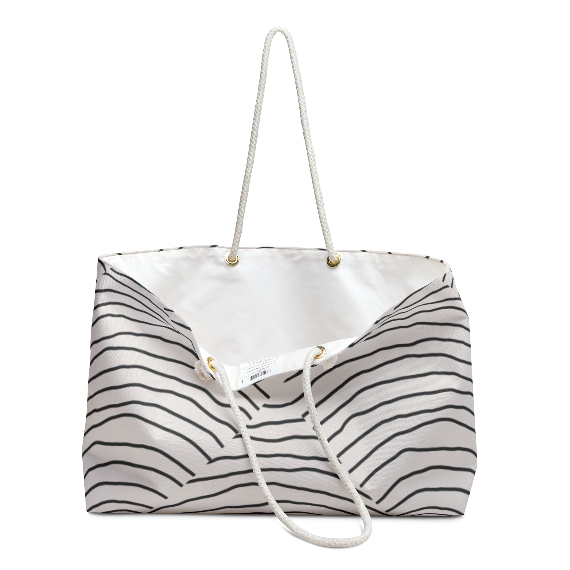 Striped tote bag with a white handle on a white background