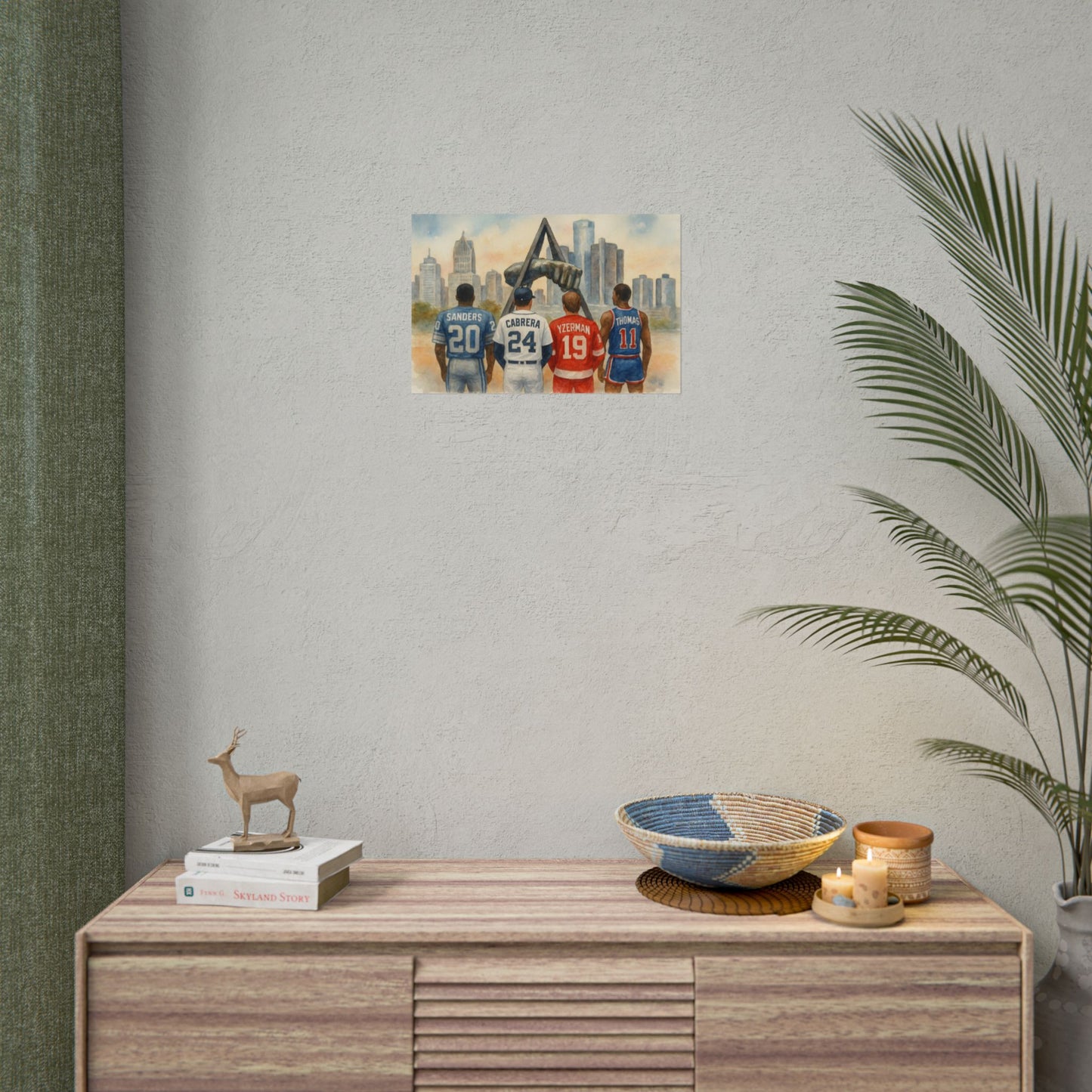Wall art of sports players on a cityscape above a wooden console table with decorative items.