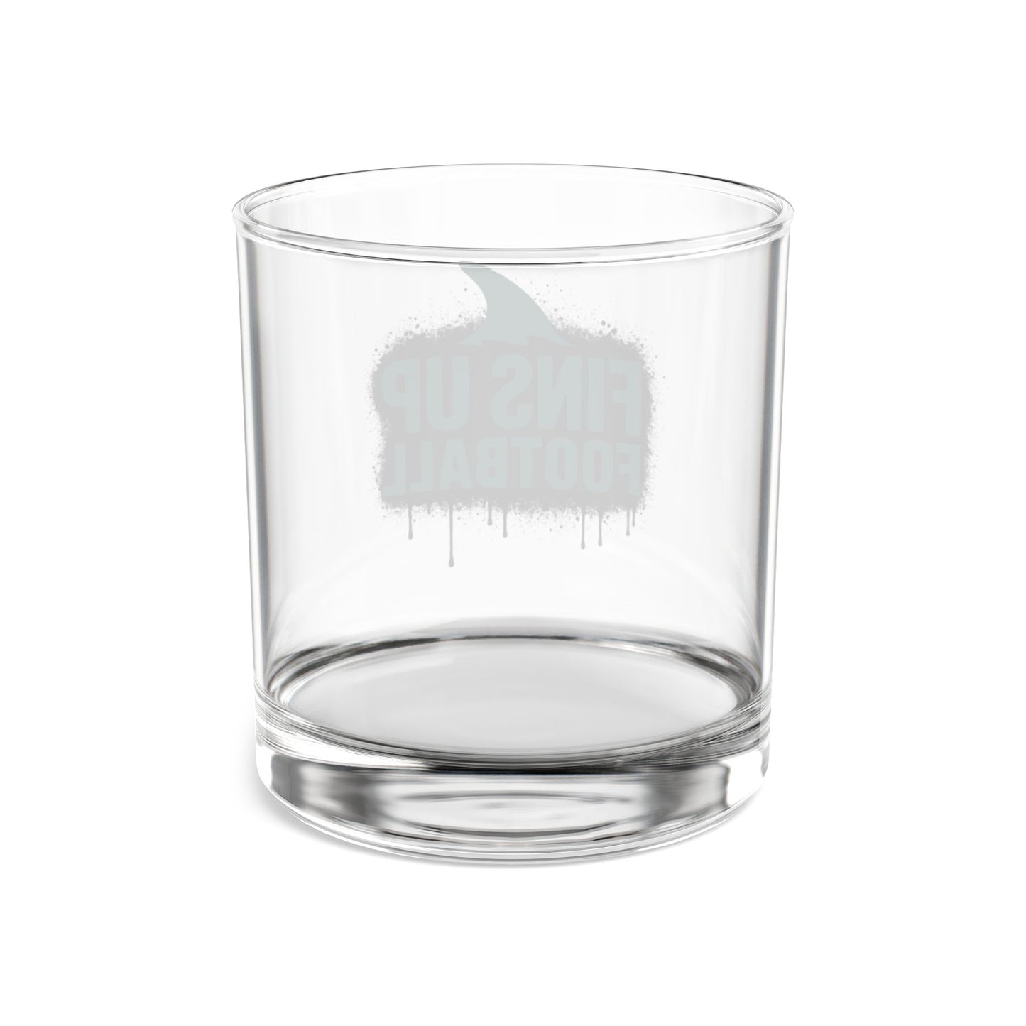 Clear glass tumbler with a white elephant design on a white background