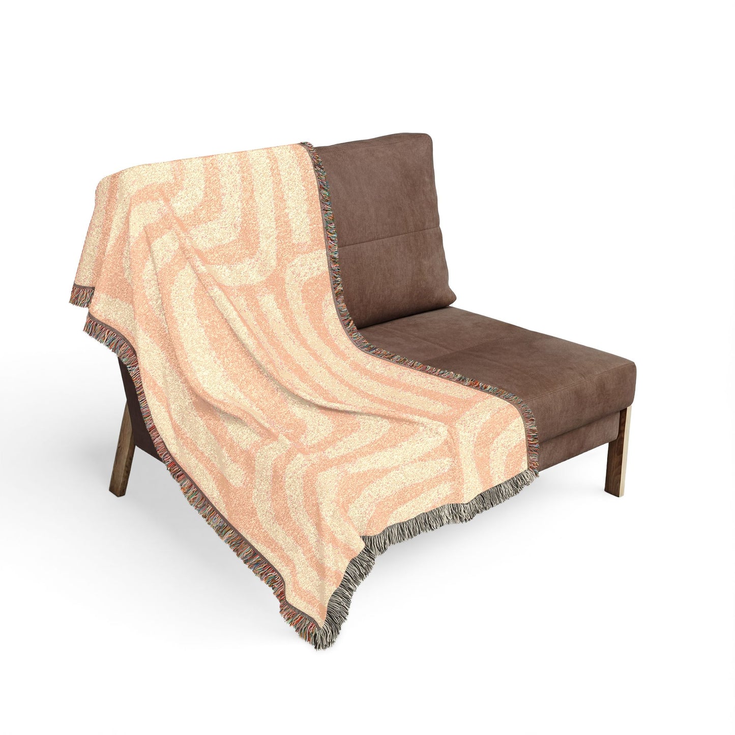 Brown chair with a beige patterned throw blanket on a white background