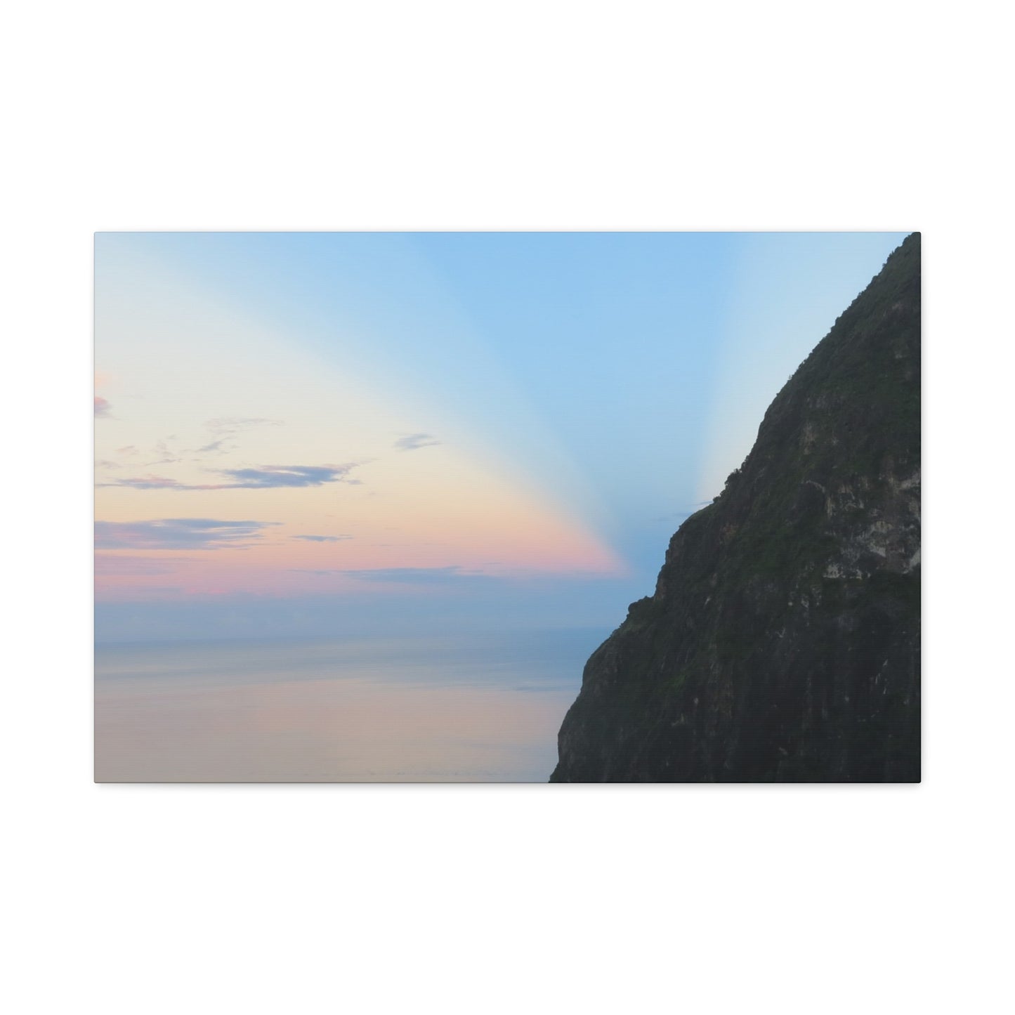 Mountain peak with a colorful sky