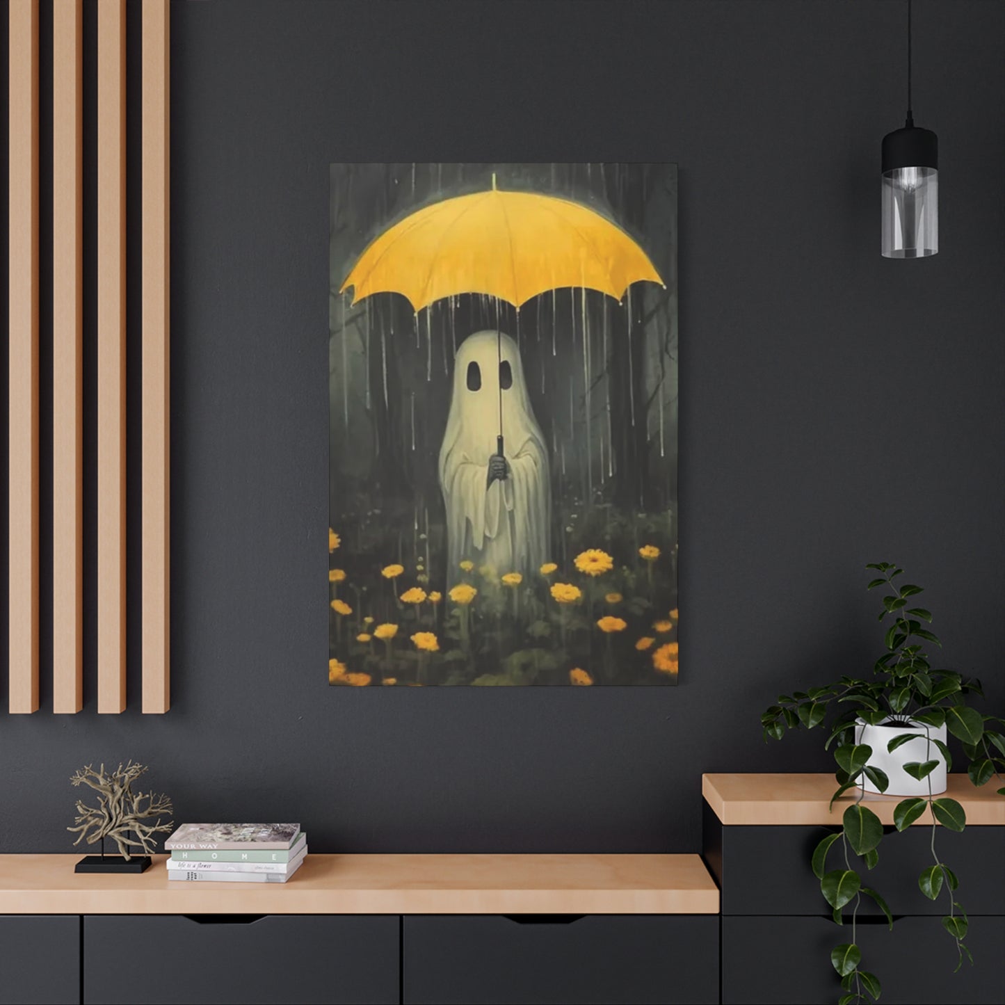 Art print of a ghost with a yellow umbrella in a rainstorm, hanging on a dark wall.