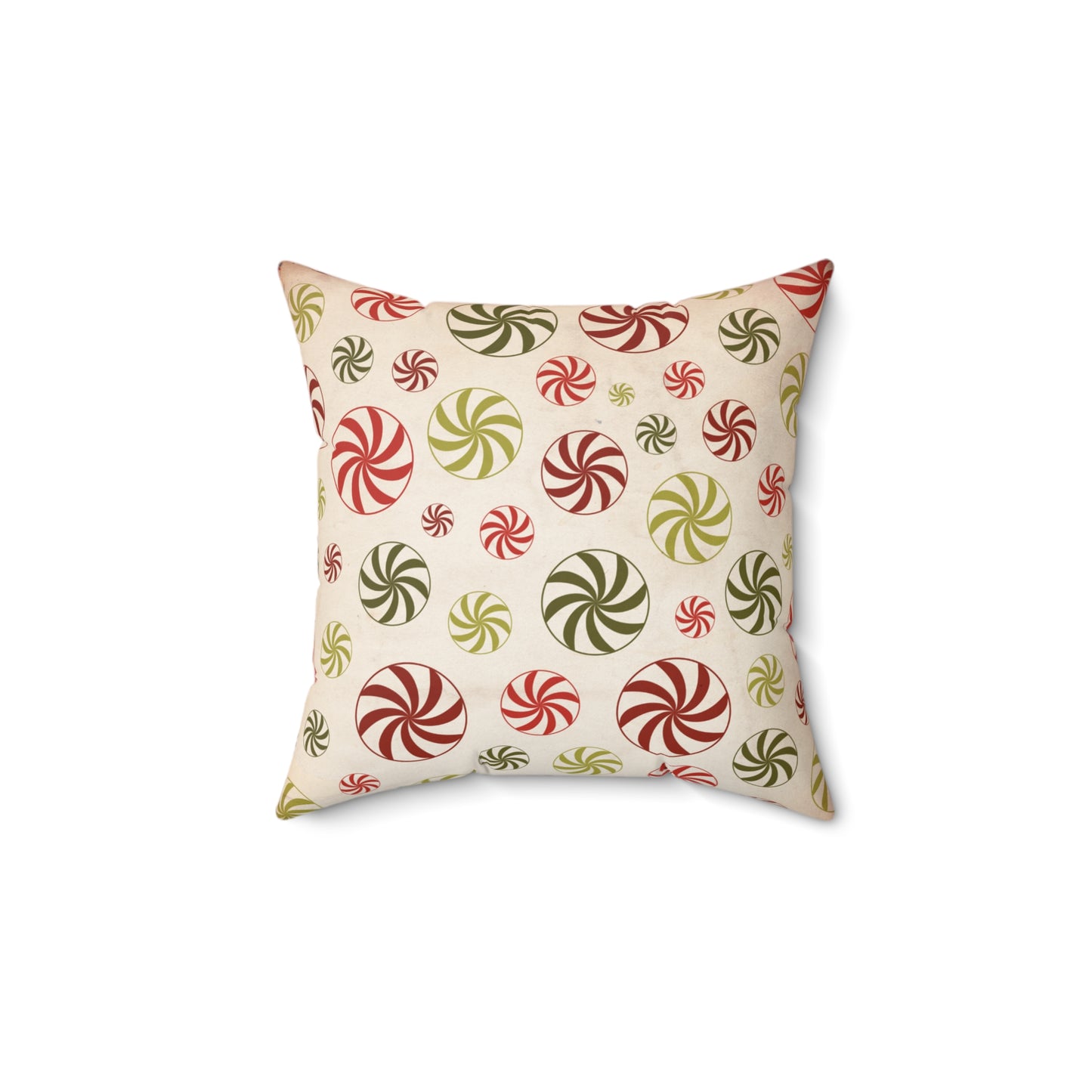 Decorative pillow with candy cane pattern on a beige background