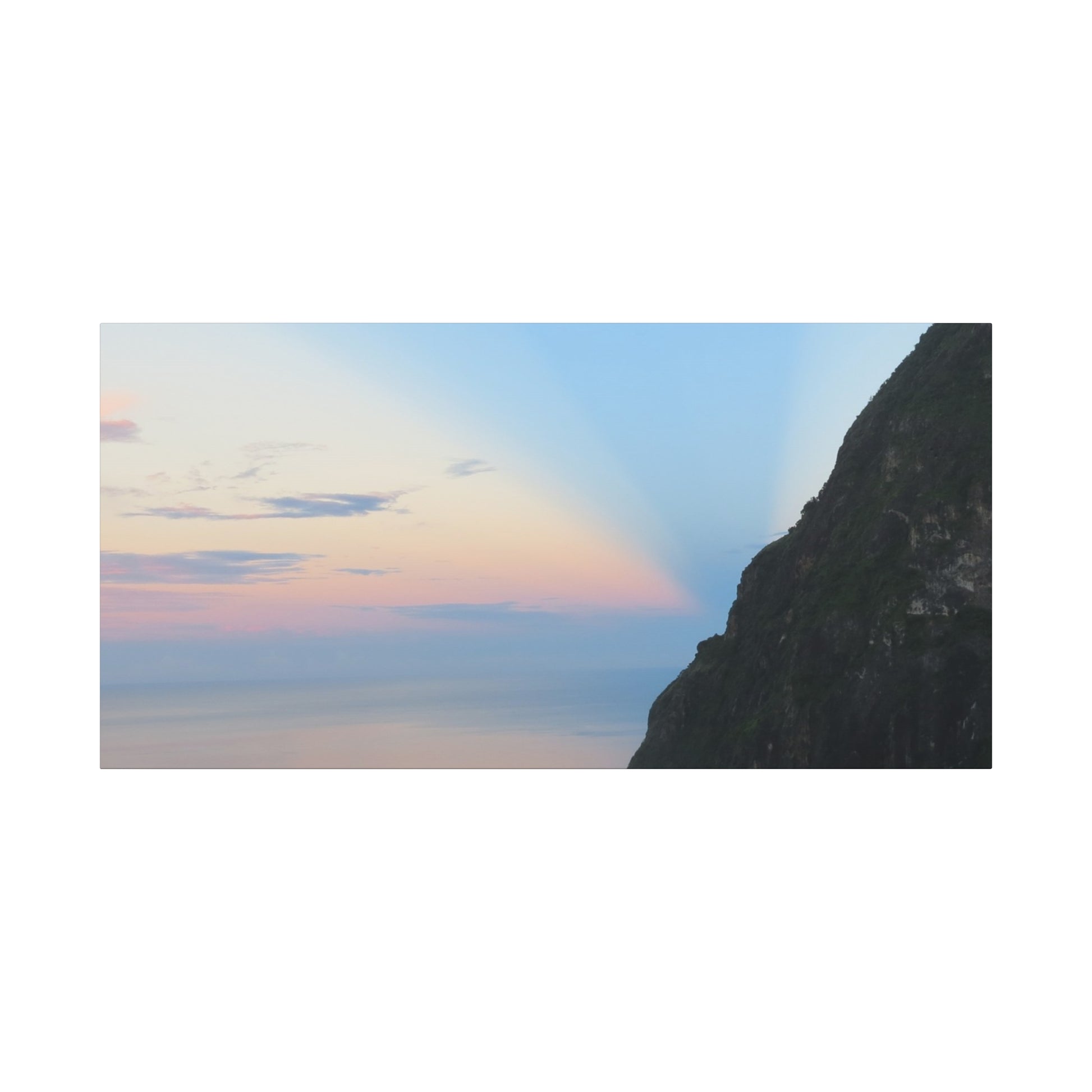 Mountain peak with a colorful sky