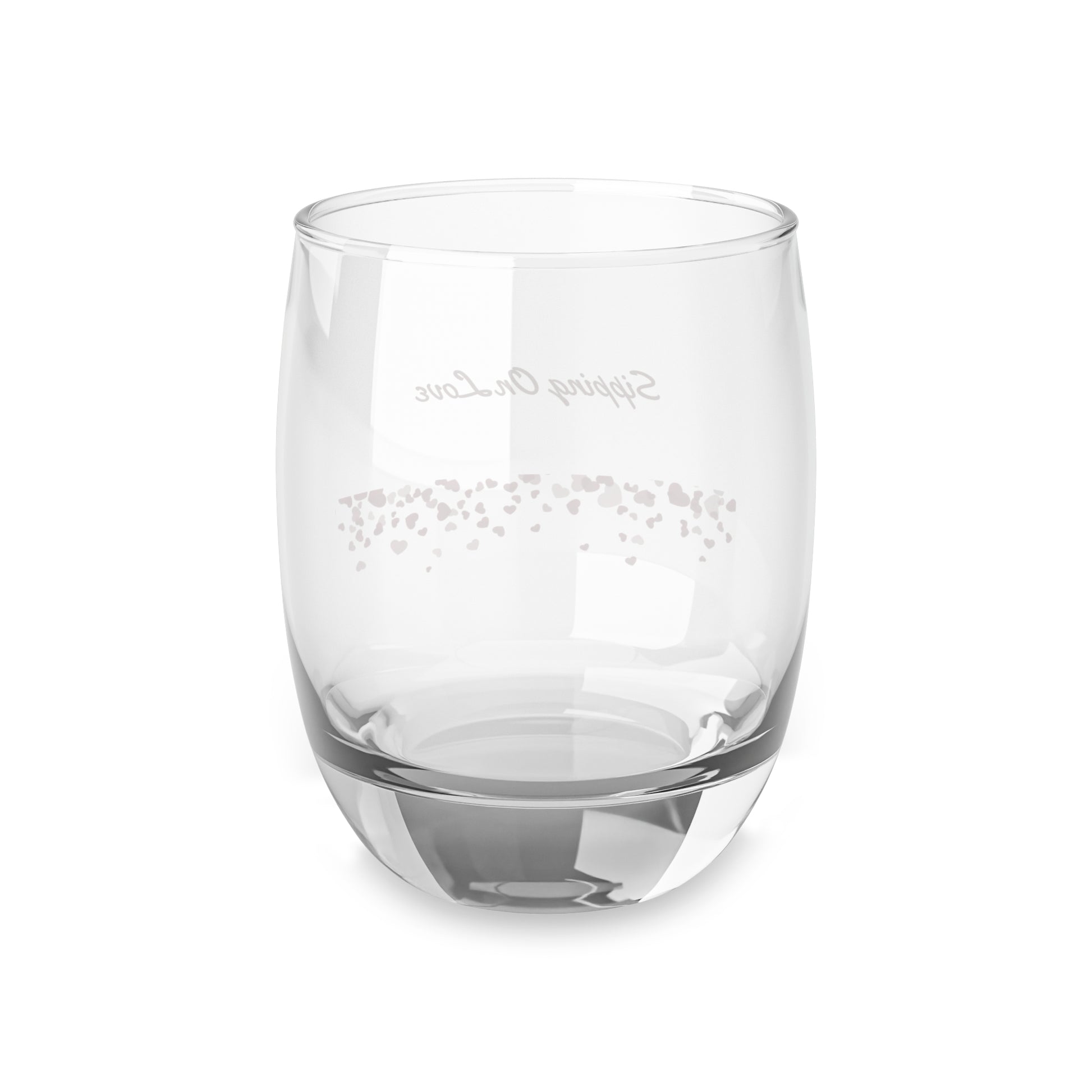Clear glass tumbler with engraved text on a white background