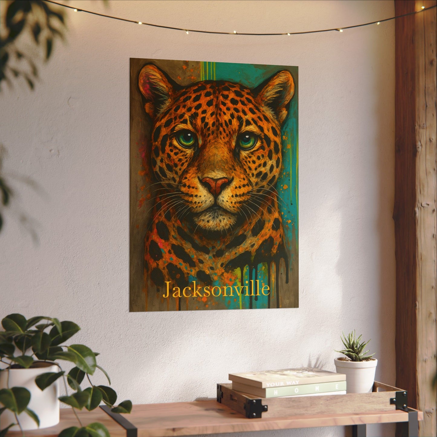 Colorful leopard painting with 'Jacksonville' text on a wall above a wooden desk.