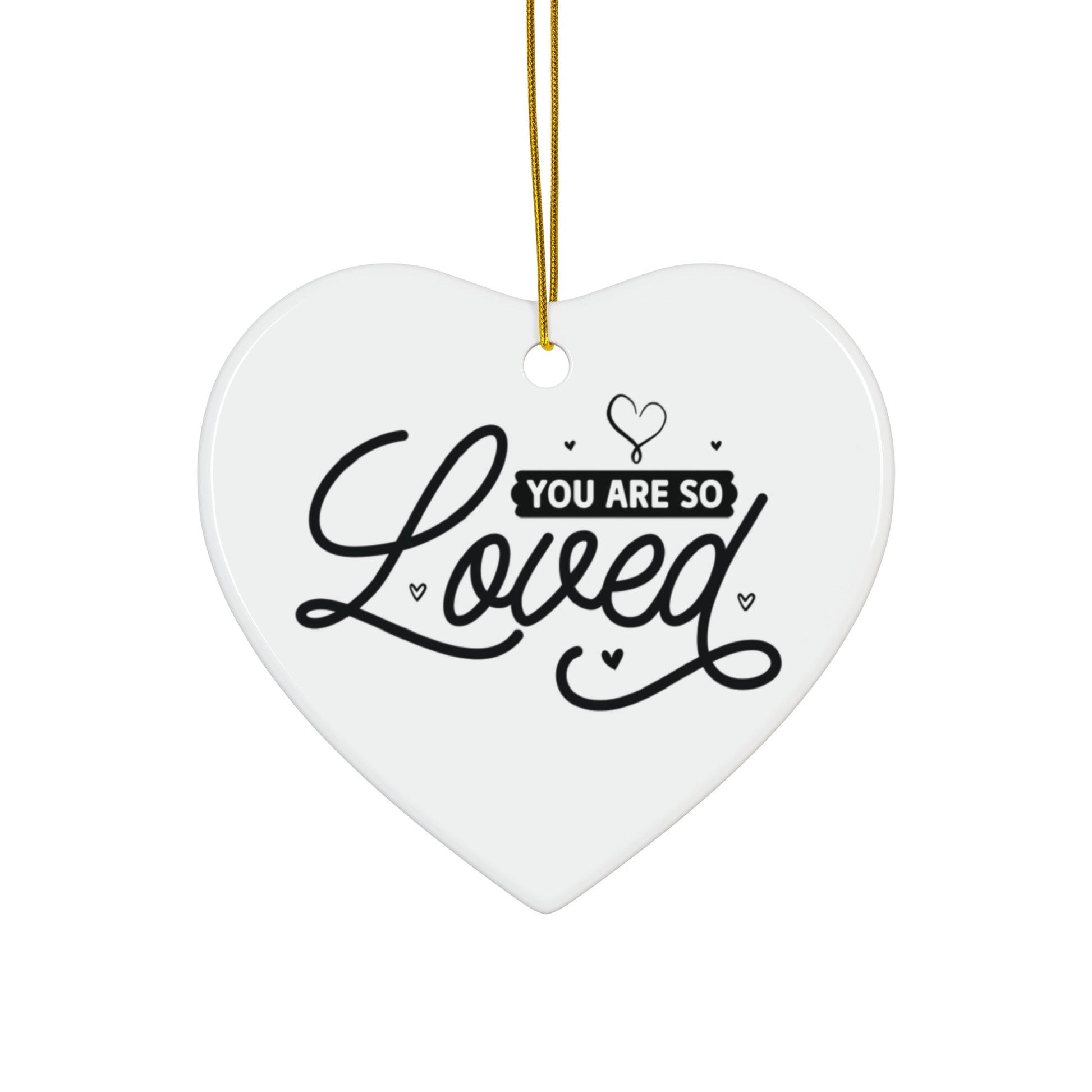 Heart-shaped white ornament with 'You are so loved' text on a white background