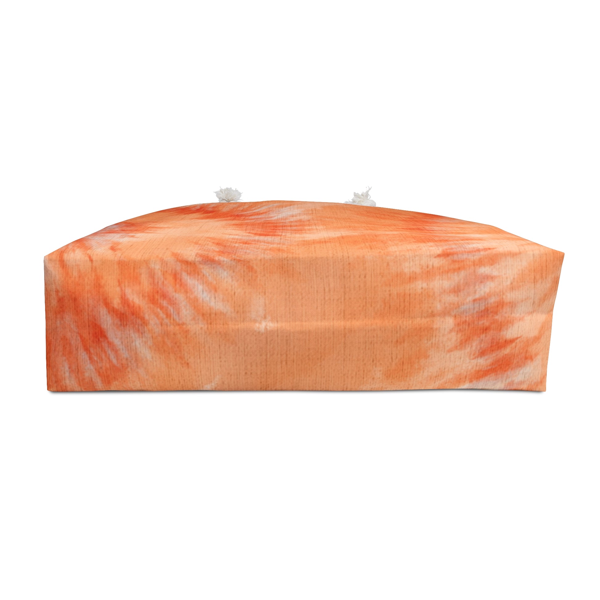 Rectangular candle with orange and white marbled pattern on a white background