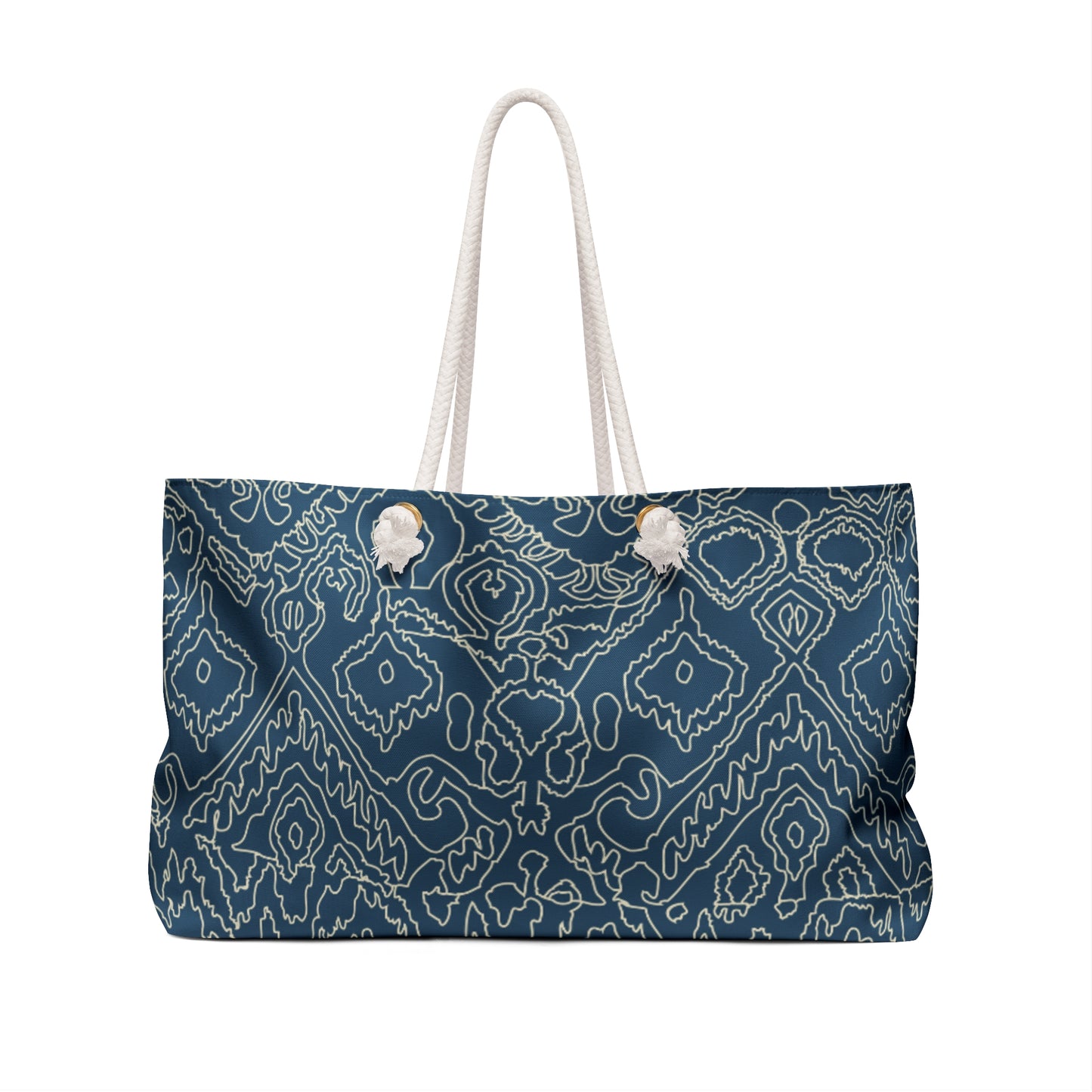 Blue patterned tote bag with white handles on a white background
