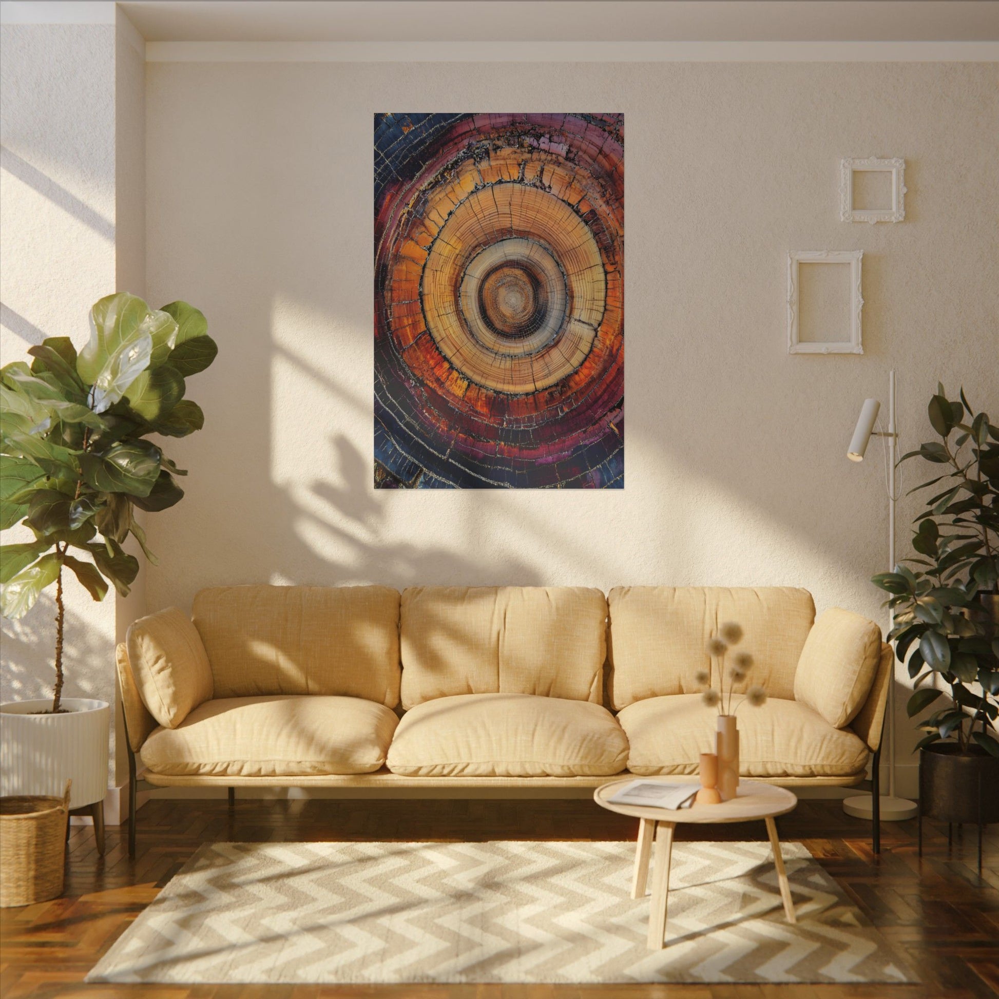 Living room with a beige sofa, round coffee table, and abstract wall art.
