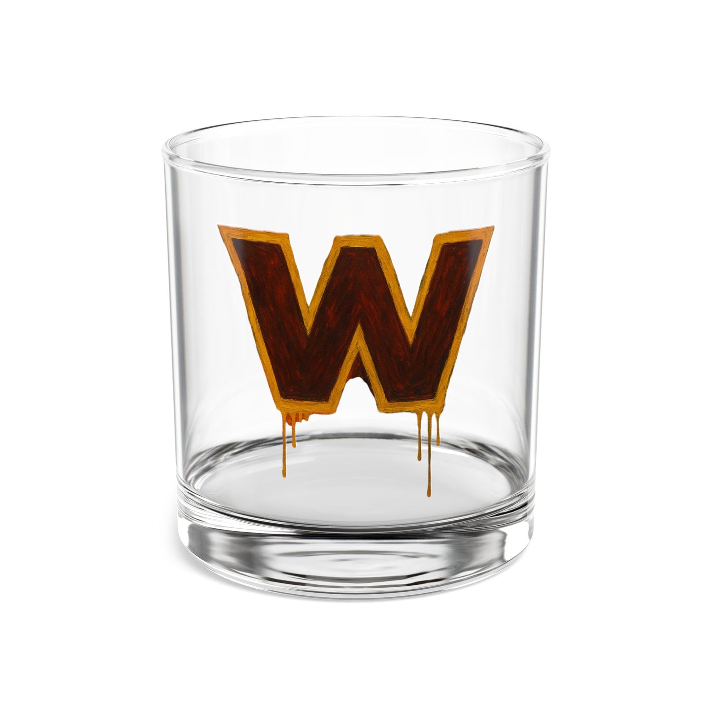 Clear glass tumbler with a large brown 'W' design on a white background