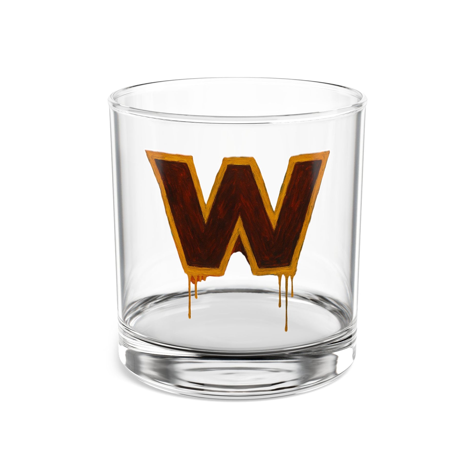 Clear glass tumbler with a large brown 'W' design on a white background