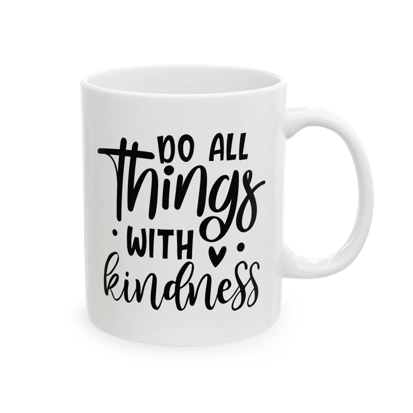 White mug with black text 'Do all things with kindness' on a white background