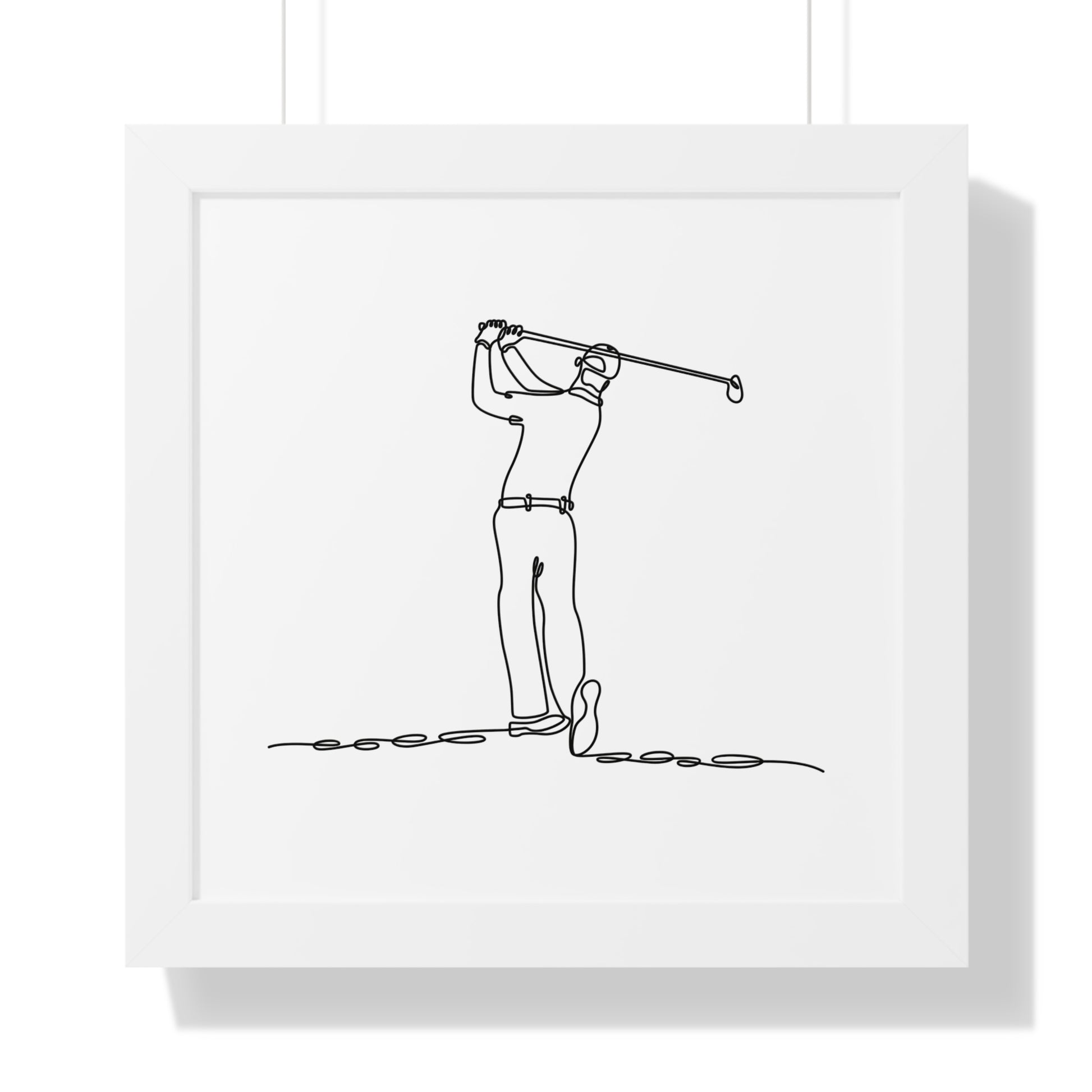 Framed black and white line drawing of a golfer in action on a white background