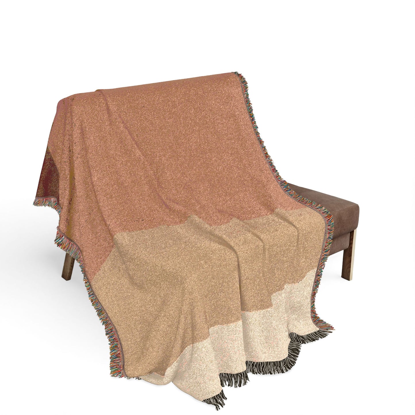 Brown and beige plaid blanket draped over a chair on a white background