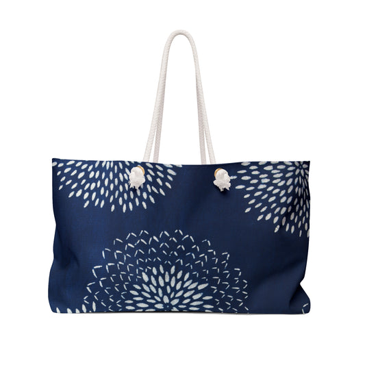 Navy blue tote bag with white geometric pattern on a white background