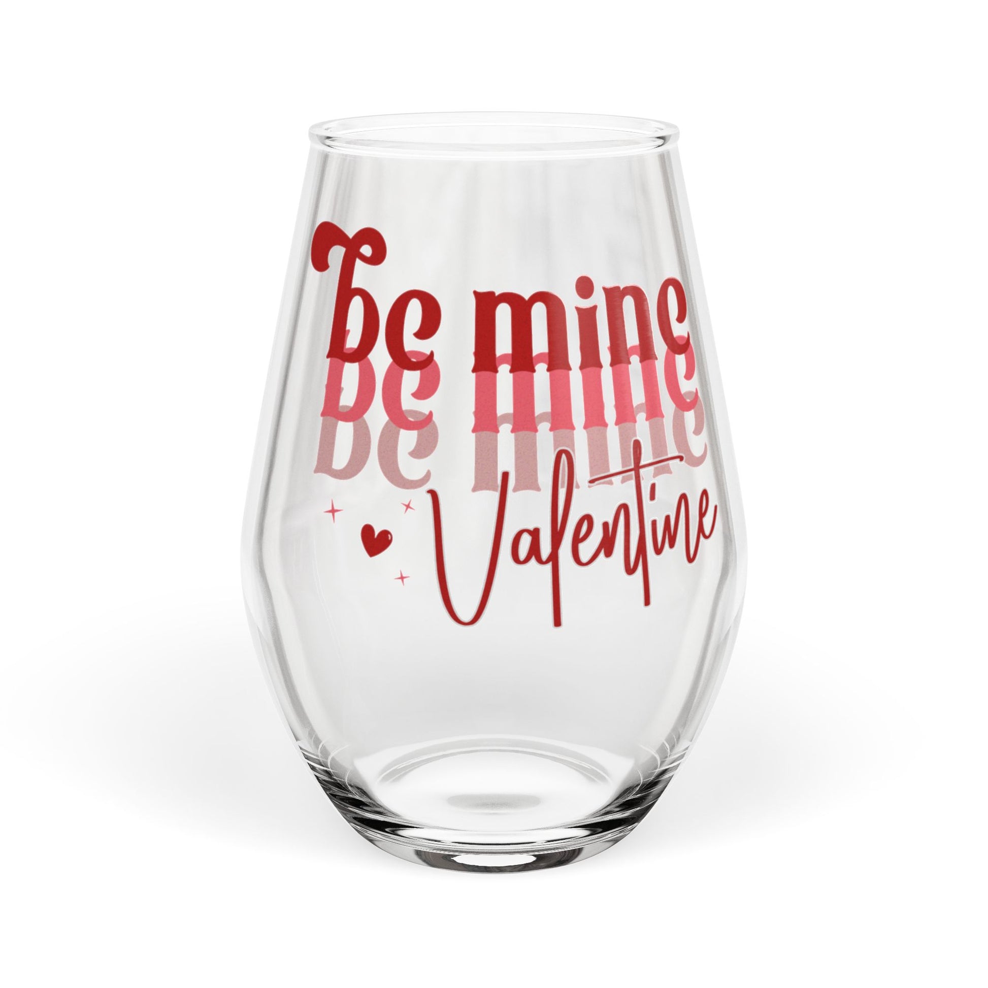 Clear glass with 'be mine be mine Valentine' text on a white background